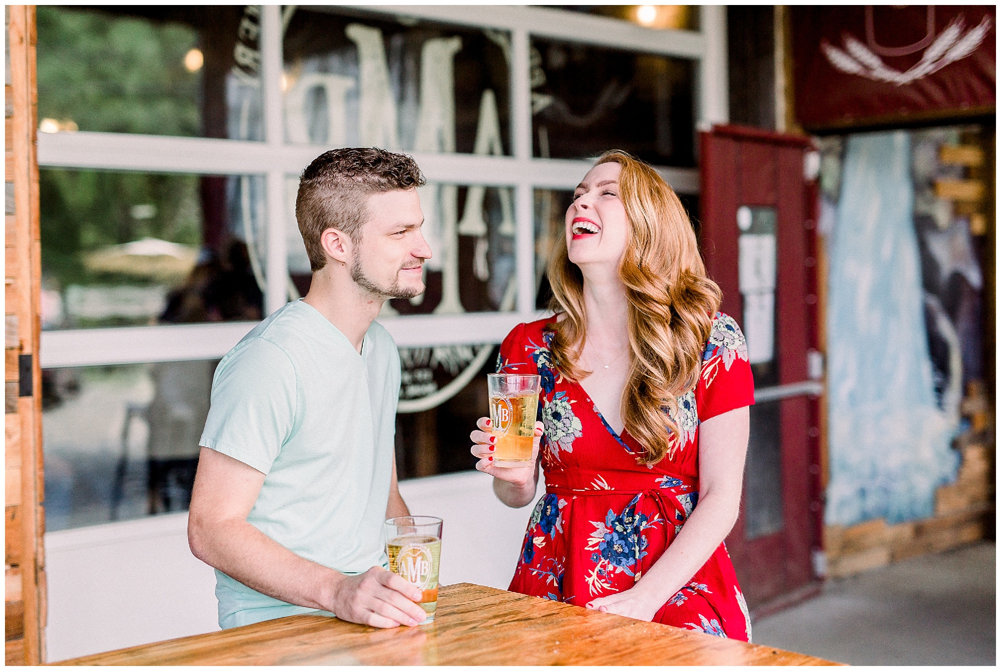 bride laughs during engagement session at Appalachian Mountain Brewing 