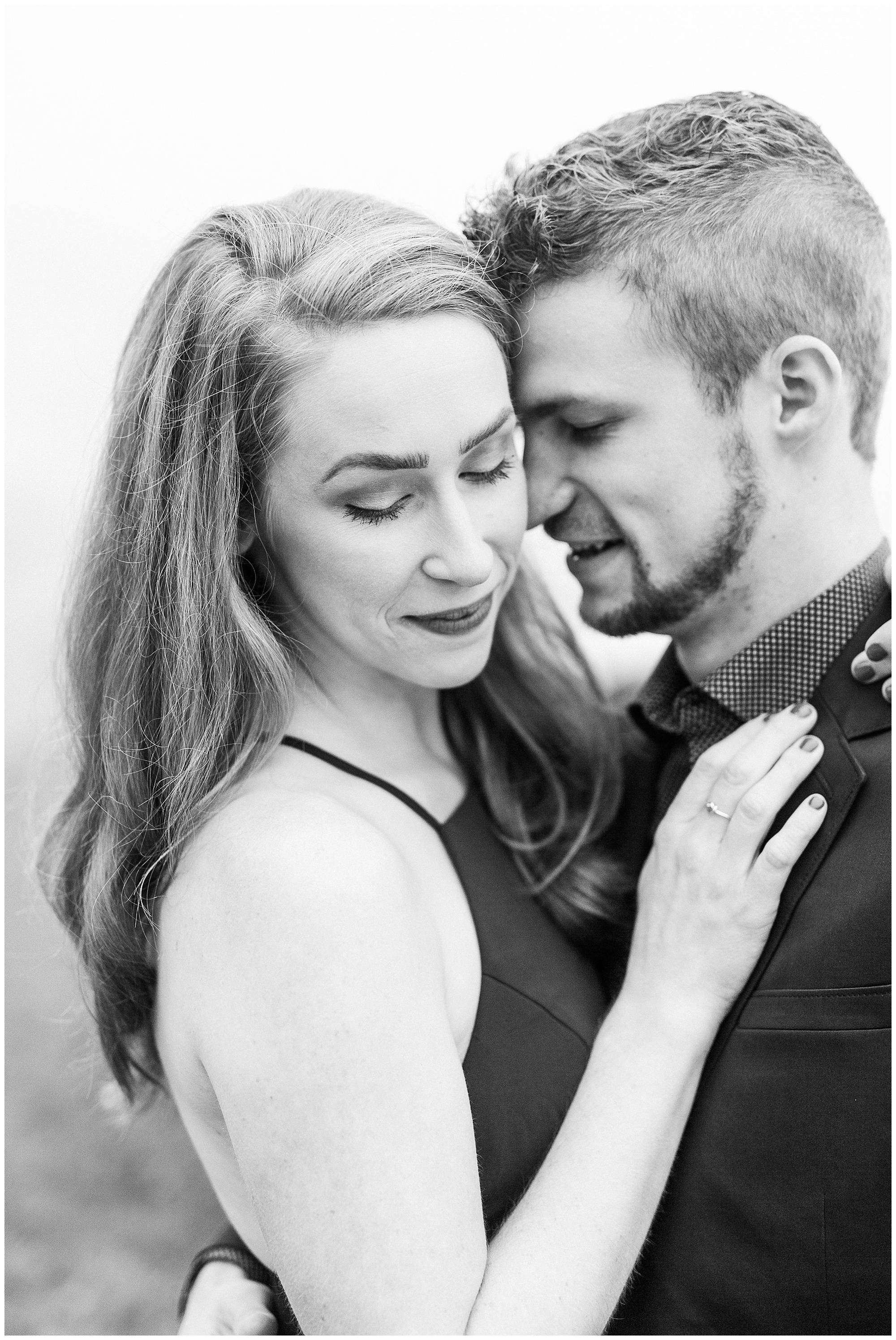 dramatic black and white engagement portrait during foggy mountain engagement session