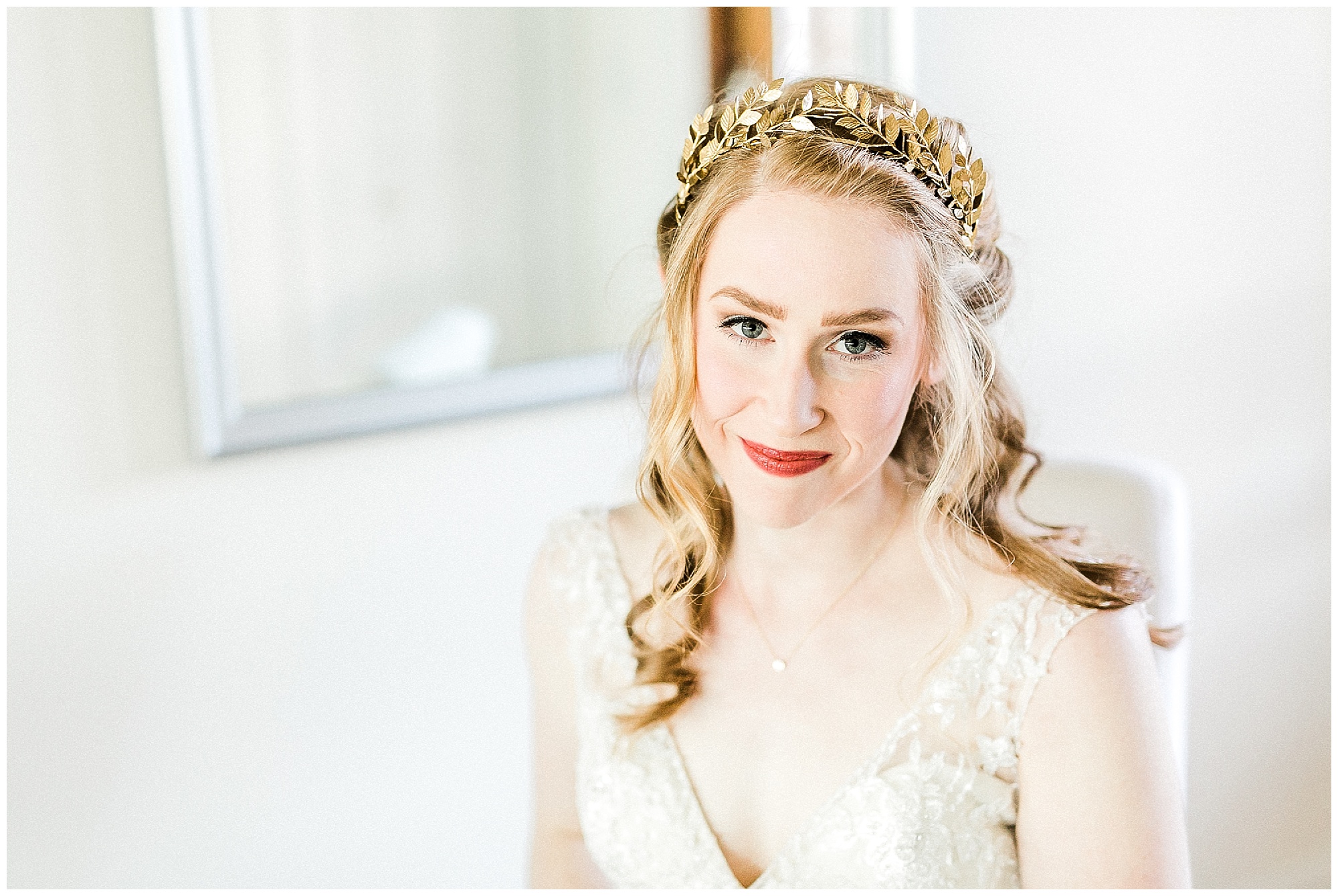 winter bride with gold crown smiles at NC wedding photographer