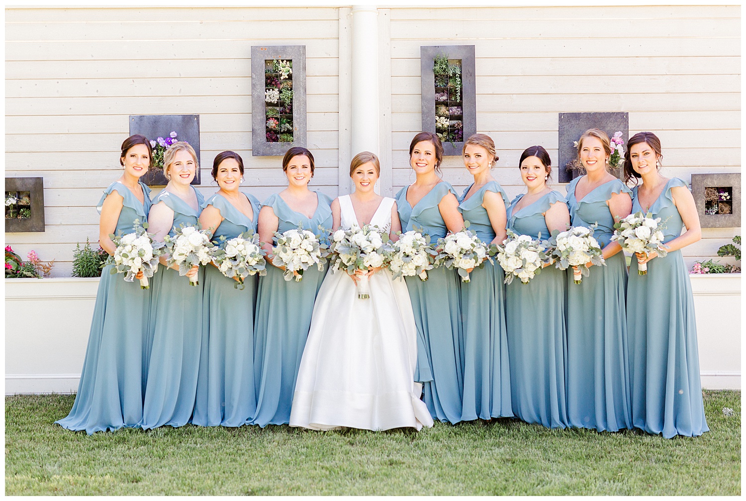 a bride with her bridesmaids at the separk mansion in north carolina