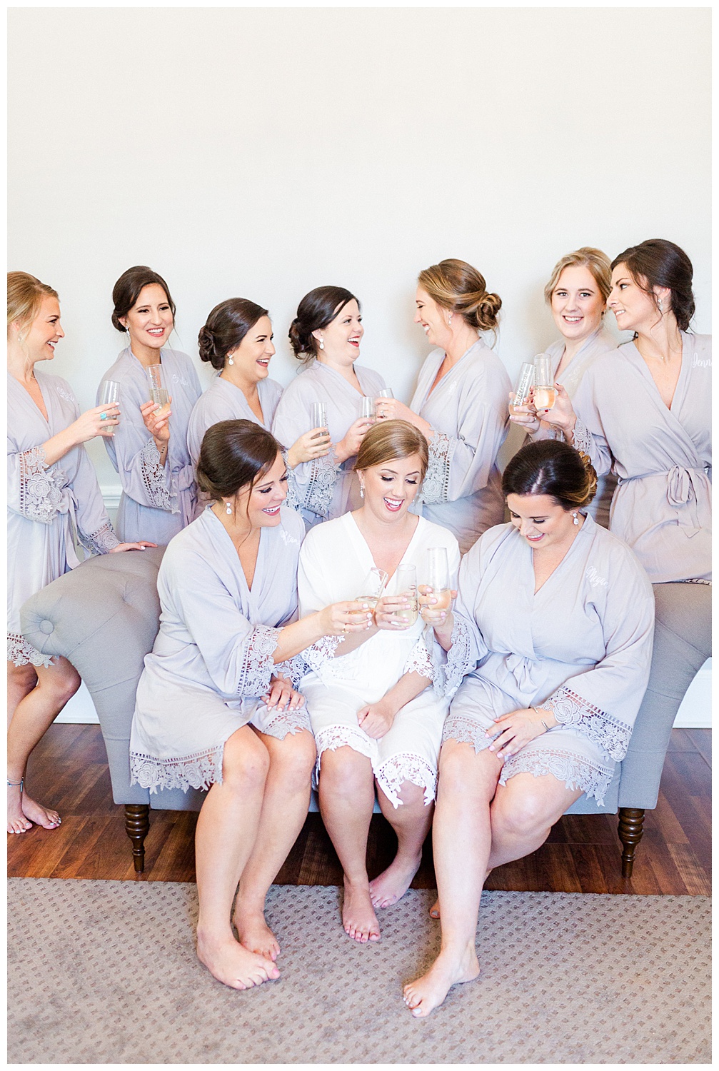 bride and her bridesmaids relaxing before getting dressed