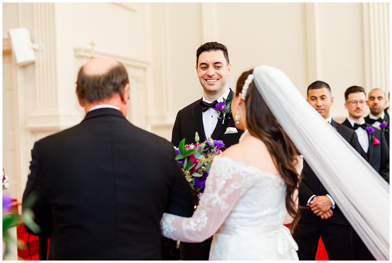 💍 emotional dad father of bride walks daughter down the aisle and groom sees bride for first time first look at wedding ceremony in indoor church 💍 Bright Colorful Summer City Wedding in Charlotte, NC with Taryn and Ryan | Kevyn Dixon Photography