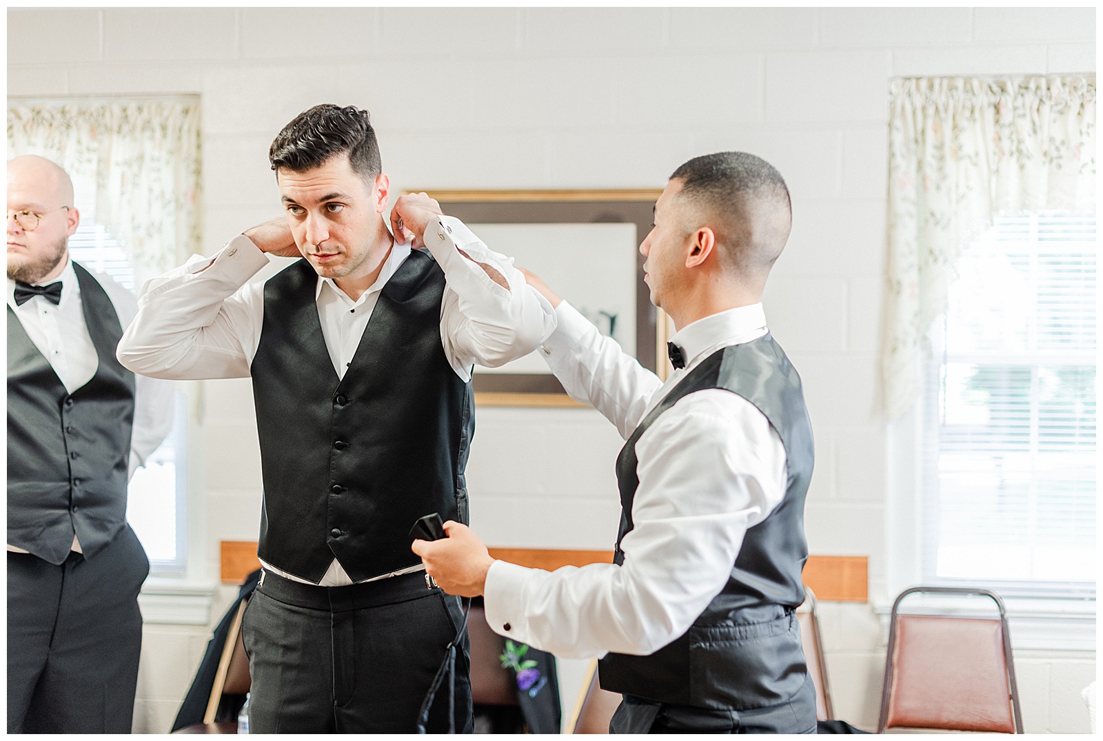 💍 groom and groomsmen getting ready shot 🤵 Groom: black tux tuxedo and purple flower boutonnière 💍 Bright Colorful Summer City Wedding in Charlotte, NC with Taryn and Ryan | Kevyn Dixon Photography