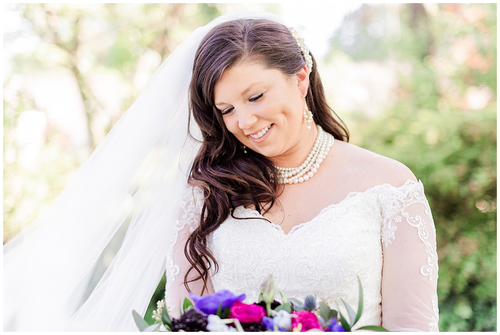 💍 bridal and detail shot of bride with colorful pink and purple bouquet in wedding portrait photo with lace wedding dress with rhinestone belt rhinestone barrette in hair down with pearls 💍 Bright Colorful Summer City Wedding in Charlotte, NC with Taryn and Ryan | Kevyn Dixon Photography