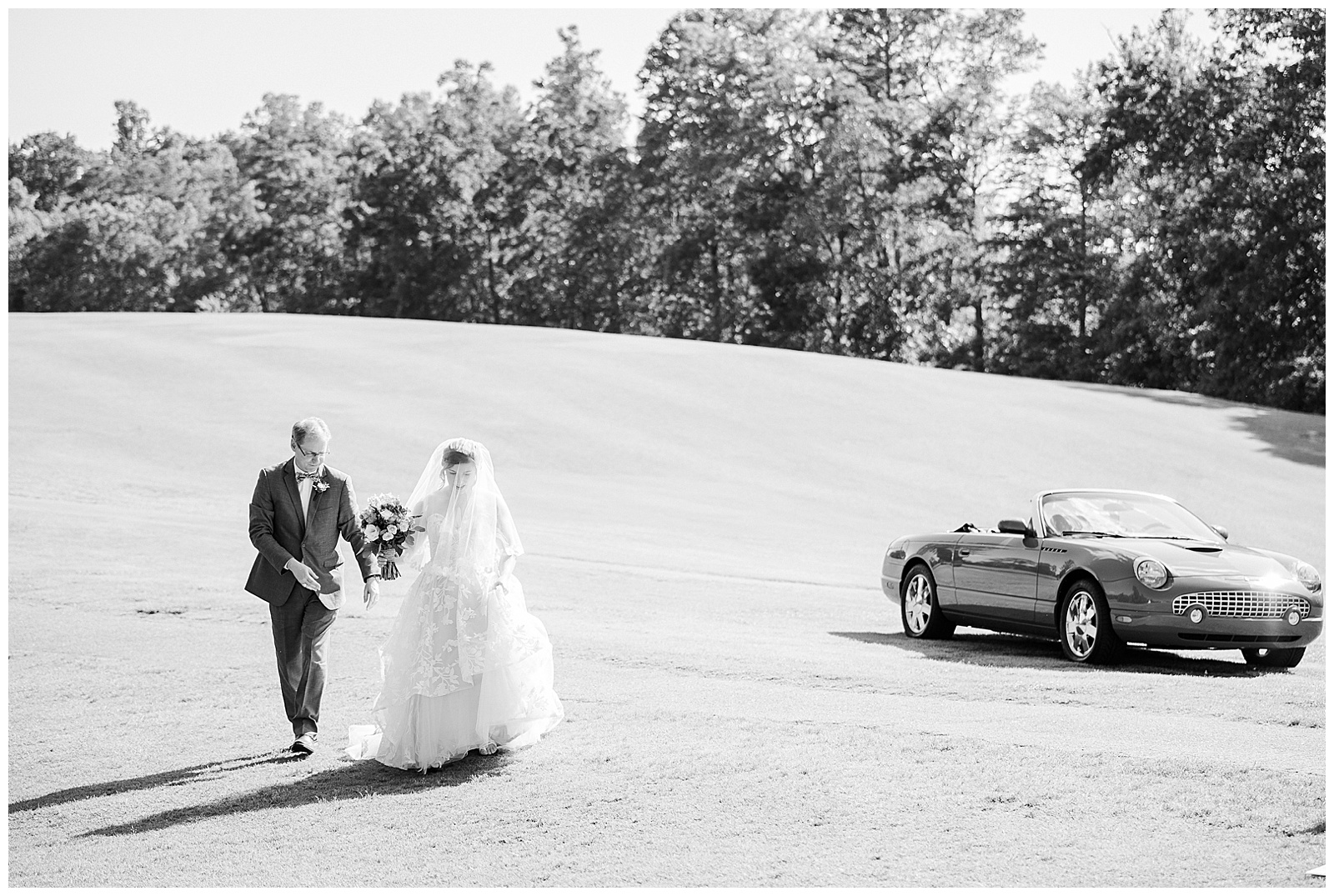 Bride Arrives at wedding in Red Ford Thunderbird from Outdoorsy Summer Wedding at North Carolina Lakehouse in the Mountains | check out the full wedding at KevynDixonPhoto.com