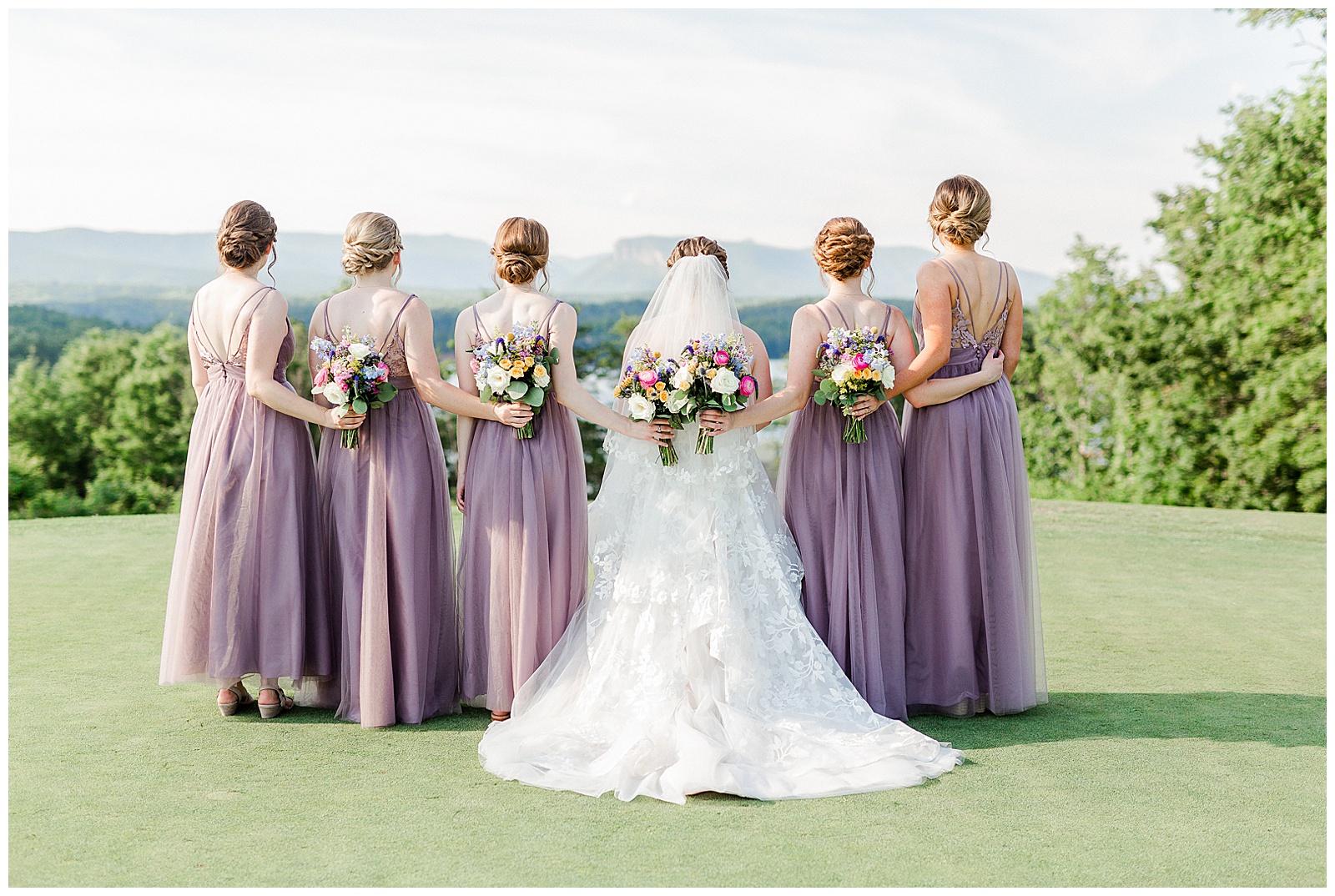 Lavender Purple Bridesmaid Dresses color themed wedding group photo from Outdoorsy Summer Wedding at North Carolina Lakehouse in the Mountains | check out the full wedding at KevynDixonPhoto.com