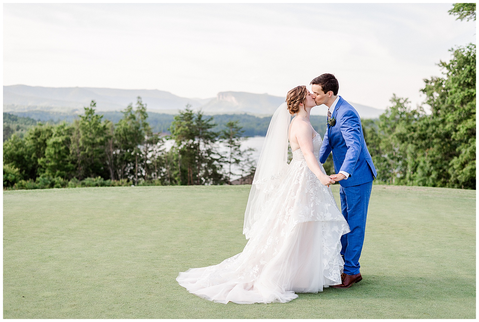 Stunning outdoor mountain photos of Bride and Groom from Outdoorsy Summer Wedding at North Carolina Lakehouse | check out the full wedding at KevynDixonPhoto.com