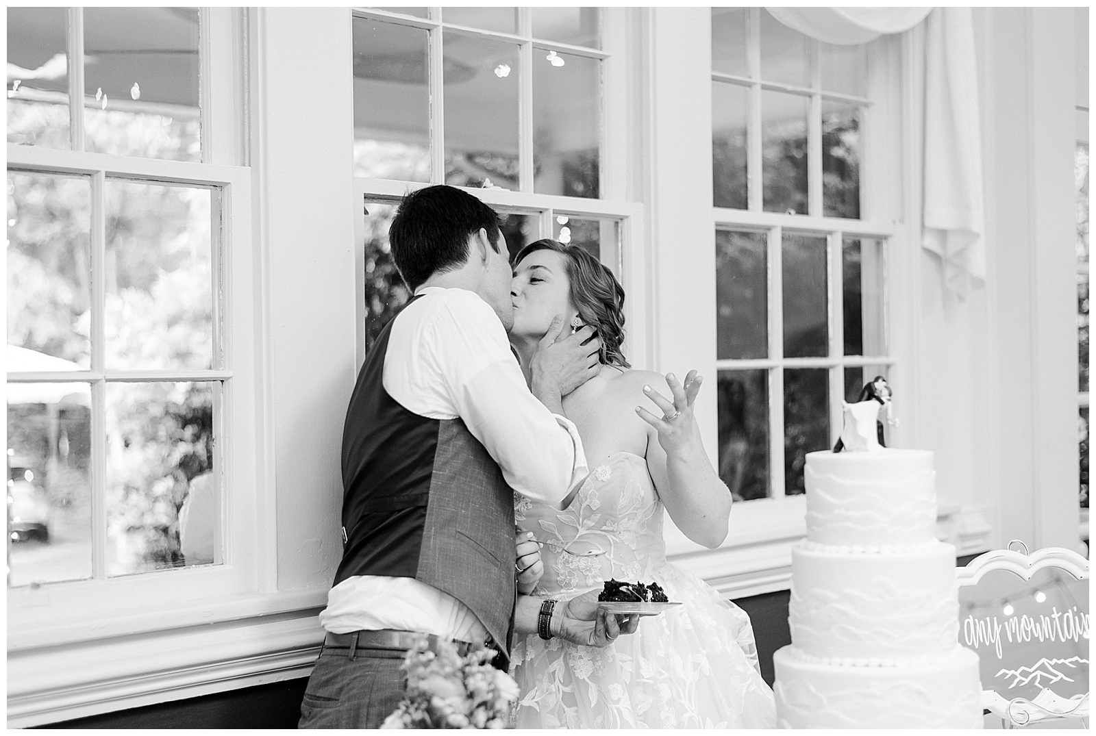 Bride and groom cut the cake at Outdoorsy Summer Wedding at North Carolina Lakehouse in the Mountains | check out the full wedding at KevynDixonPhoto.com