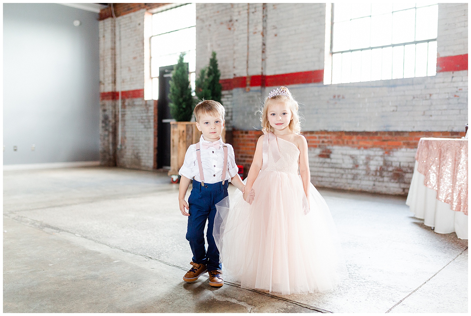 Adorable Flower Girl and Ring Boy Photos in Fluffy Pink Dress and Suspenders from Summer Wedding in Charlotte, NC | Check out the full wedding at KevynDixonPhoto.com