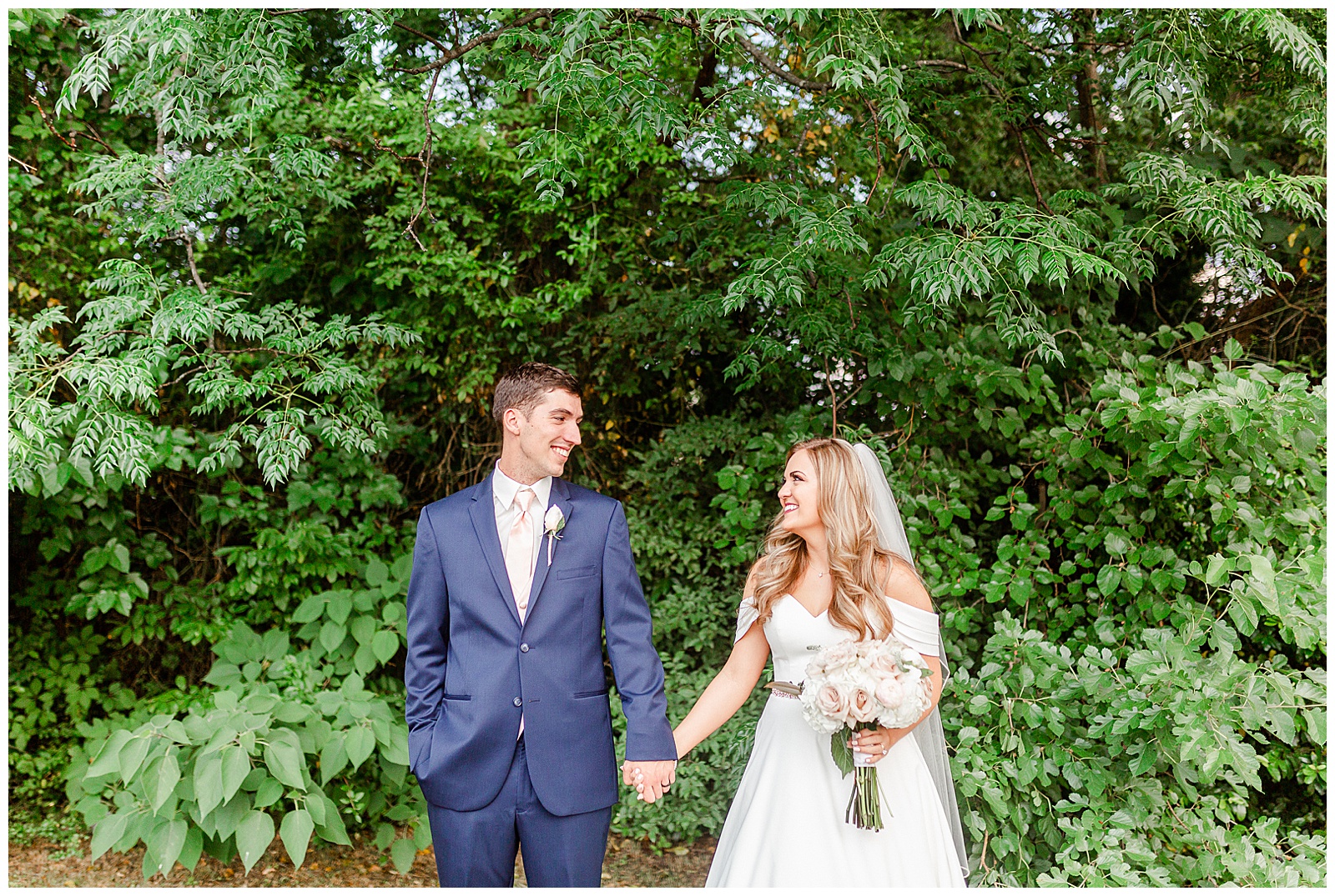 Bride and Groom Outdoor Portraits with blue suit and off shoulder wedding dress from Summer Wedding in Charlotte, NC | Check out the full wedding at KevynDixonPhoto.com