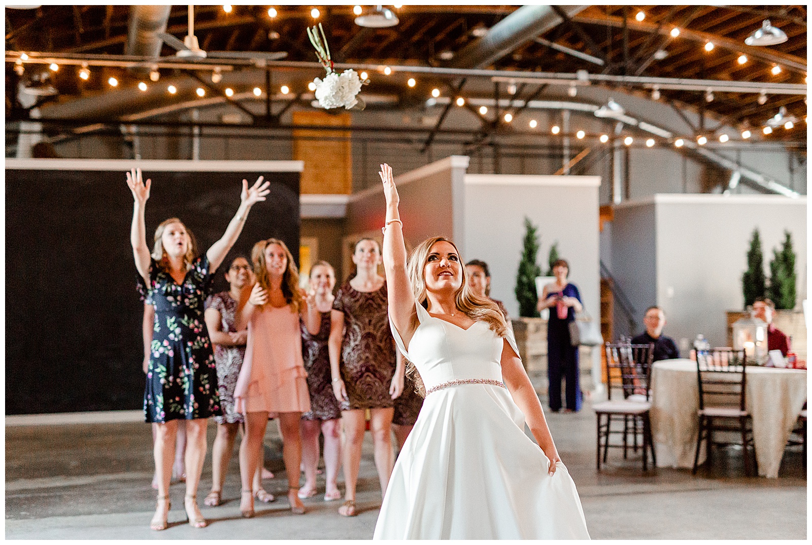 Funny bridesmaids catch the bouquet from Summer Wedding in Charlotte, NC | Check out the full wedding at KevynDixonPhoto.com