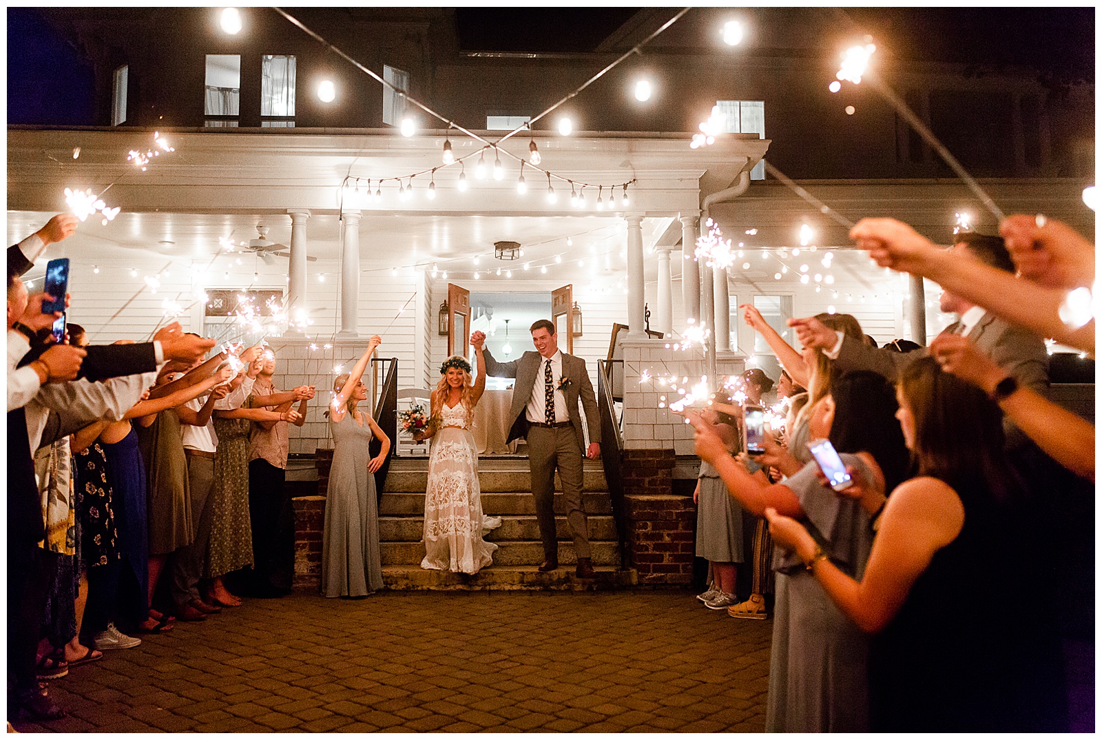 Gorgeous Sparkler Exit at Fairy Light Venue with Bohemian Bride and Groom from Boho Chic Summer Wedding in Charlotte, NC | check out the full wedding at KevynDixonPhoto.com 