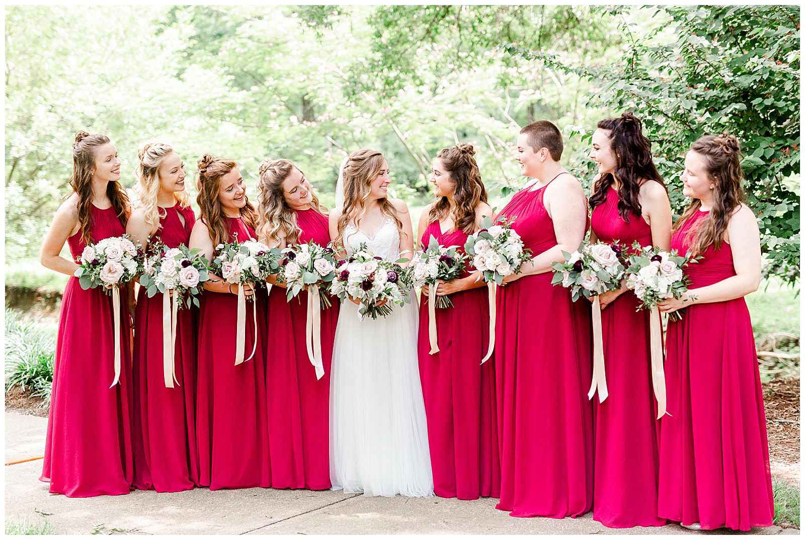 Matching Red Themed Bridesmaid Dresses from Elegant Modern Red and Navy Blue Themed Wedding in Charlotte, NC | check out the full wedding at KevynDixonPhoto.com