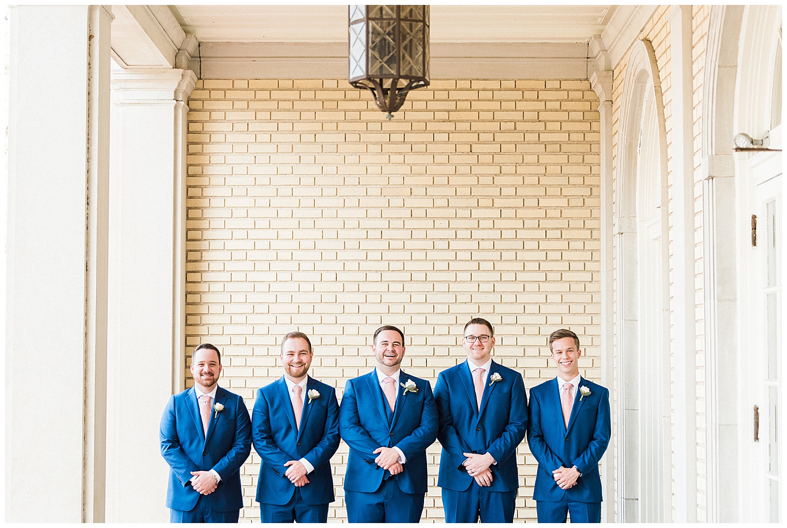 Sharp-Looking Groomsmen Navy Blue Pink Tie Outfit Ideas from Light and Airy Outdoor Wedding at Separk Mansion in Gastonia, NC | Kevyn Dixon Photography