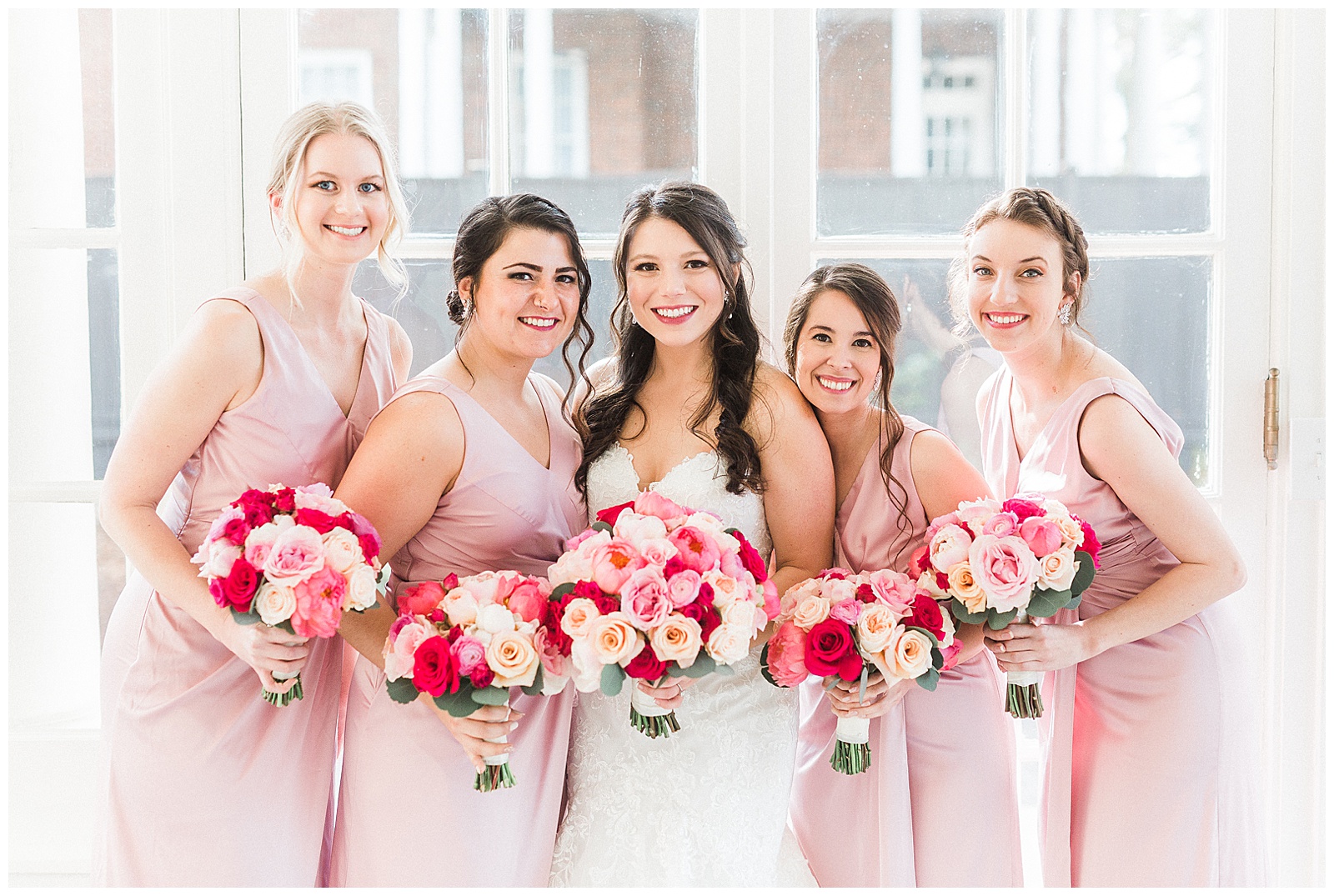 Soft Pink Color Theme Bridesmaid Bride Tribe Group Photo from Light and Airy Outdoor Wedding at Separk Mansion in Gastonia, NC | Kevyn Dixon Photography