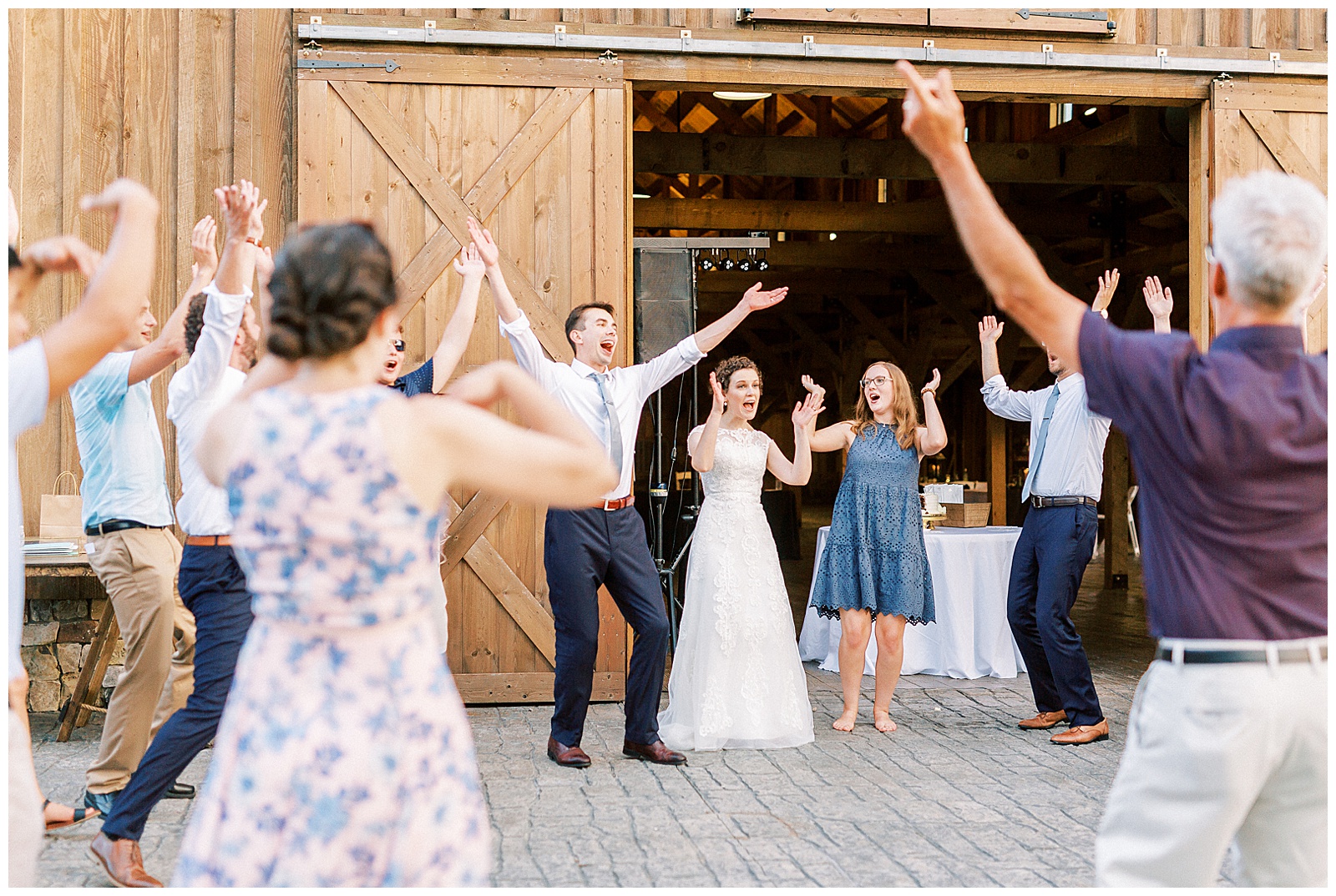 wedding day dance party at the farmstead huge open barn venue in north carolina