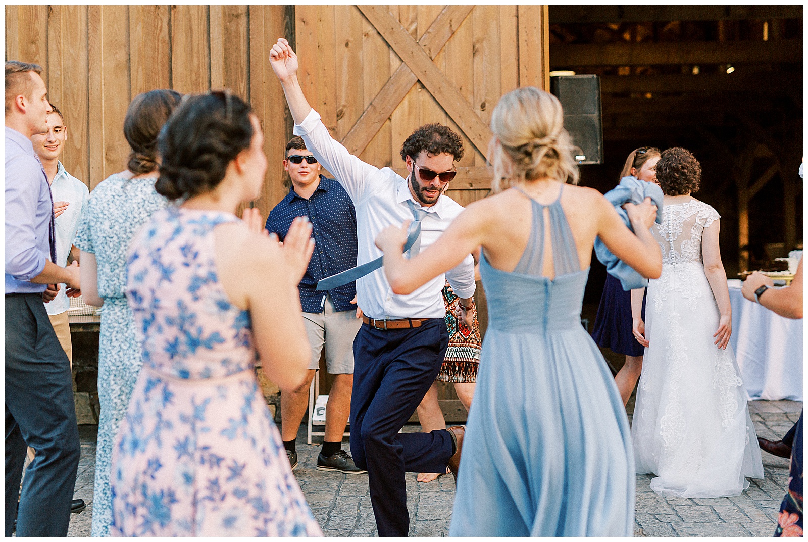 wedding day dance party at the farmstead huge open barn venue in north carolina