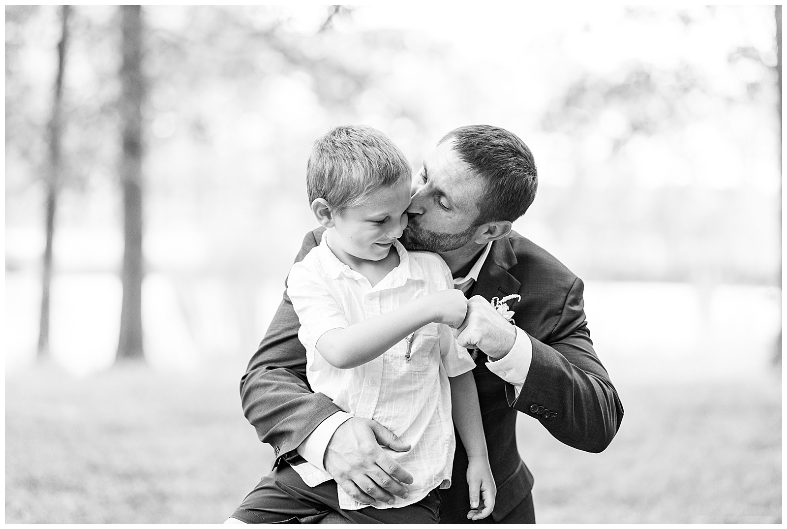 sweet father son groom portrait outdoor in summer