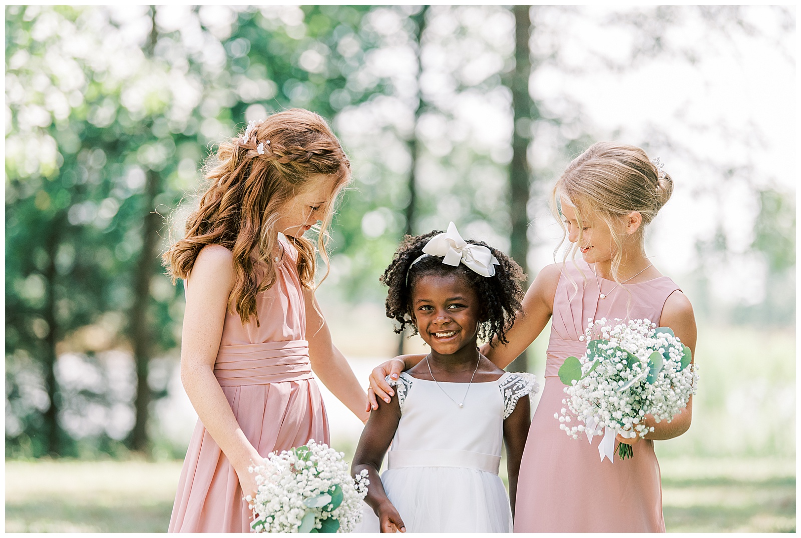 adorable outdoor flower girl portraits in pink and white dresses