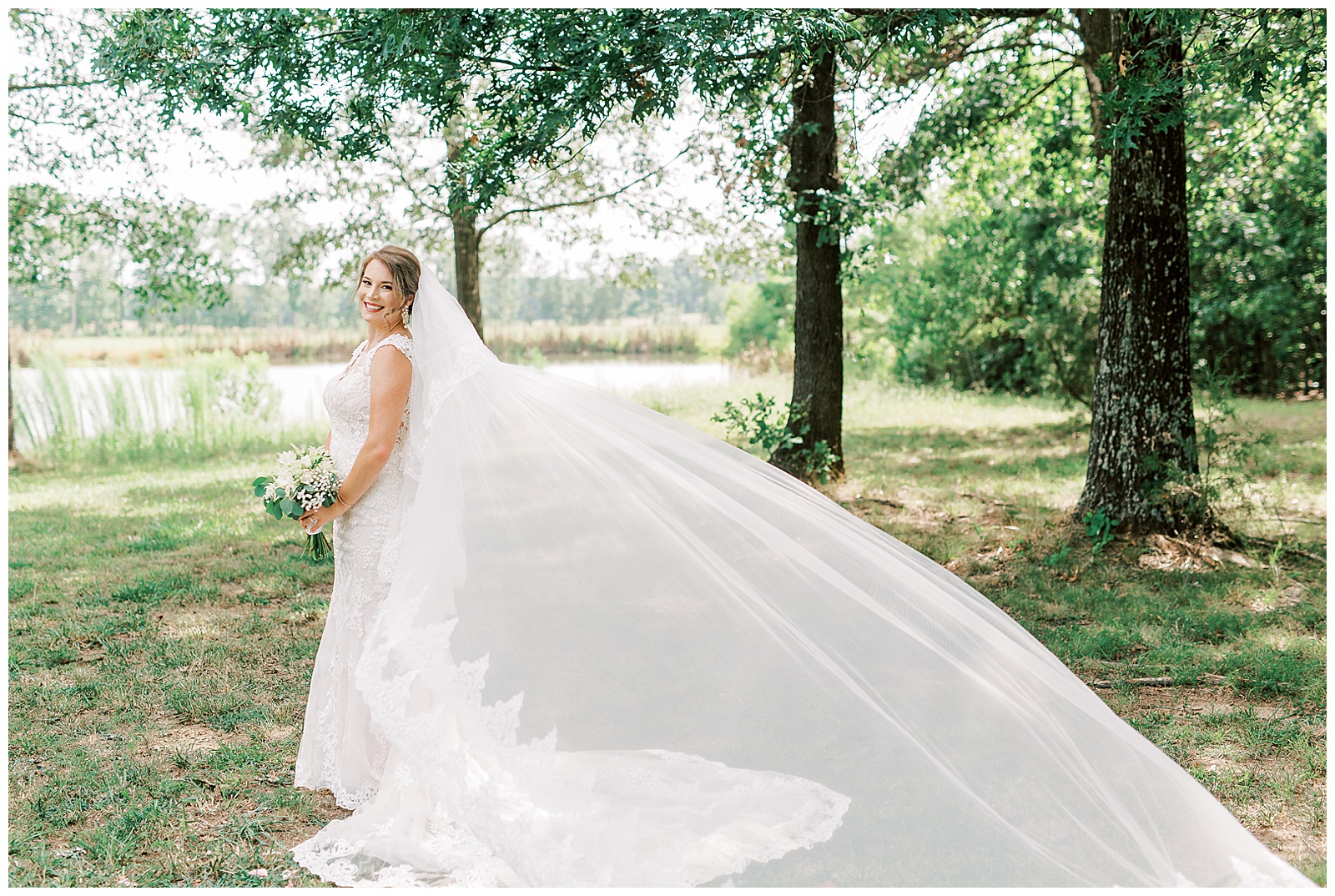 cathedral veil bridal portraits of gorgeous blonde haired bride in 
