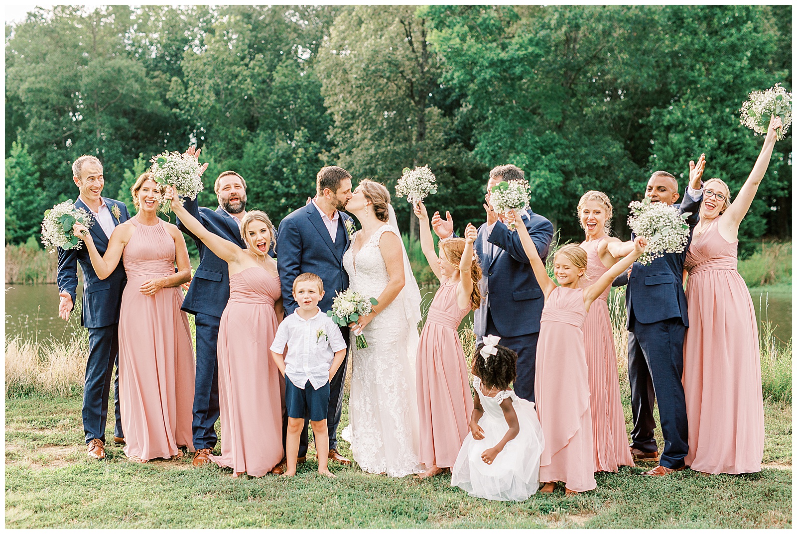 pink and navy blue bridal party portraits at outdoor summer wedding