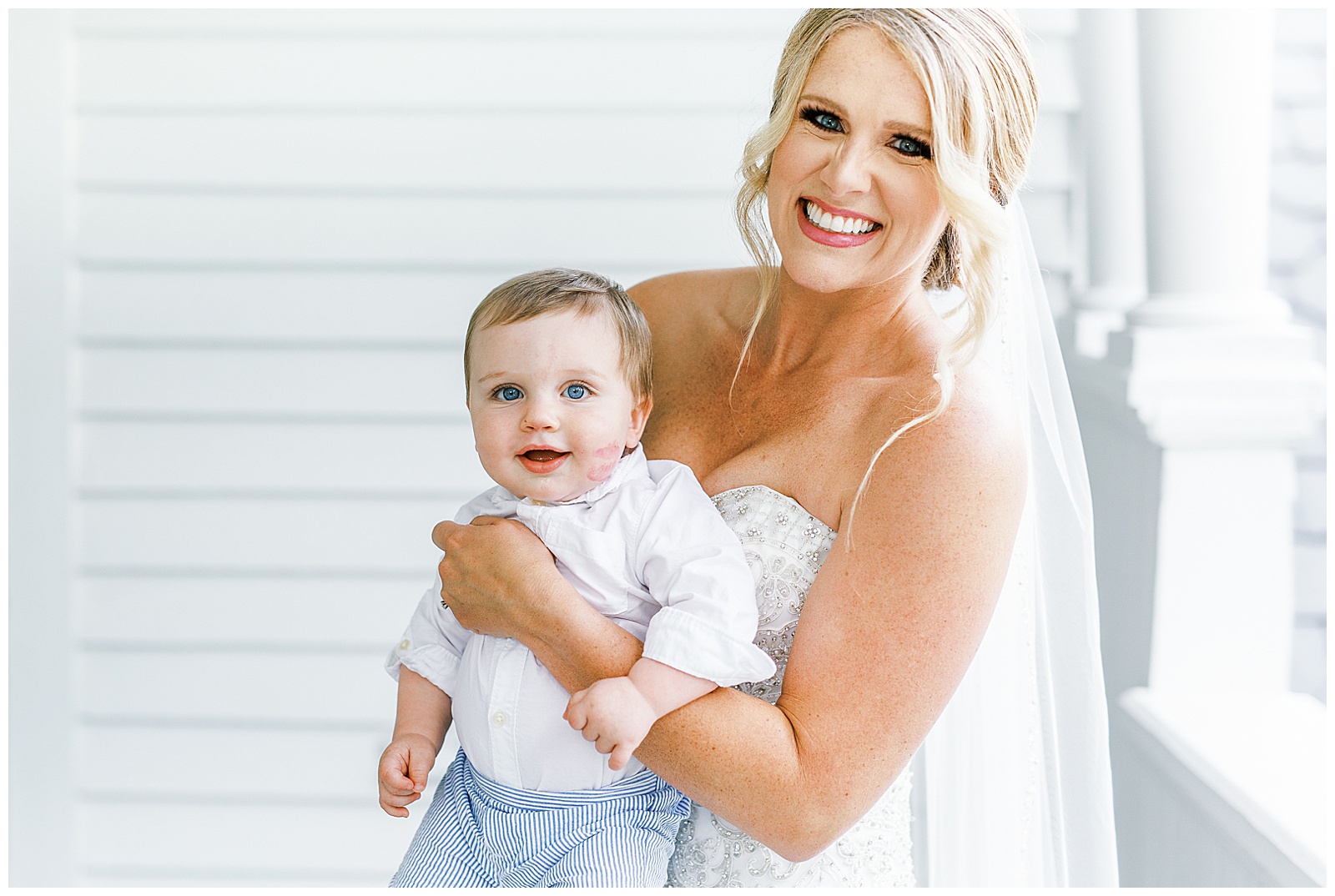 blonde haired bride hugs sweet baby son in gorgeous light and airy outdoor bridal portraits