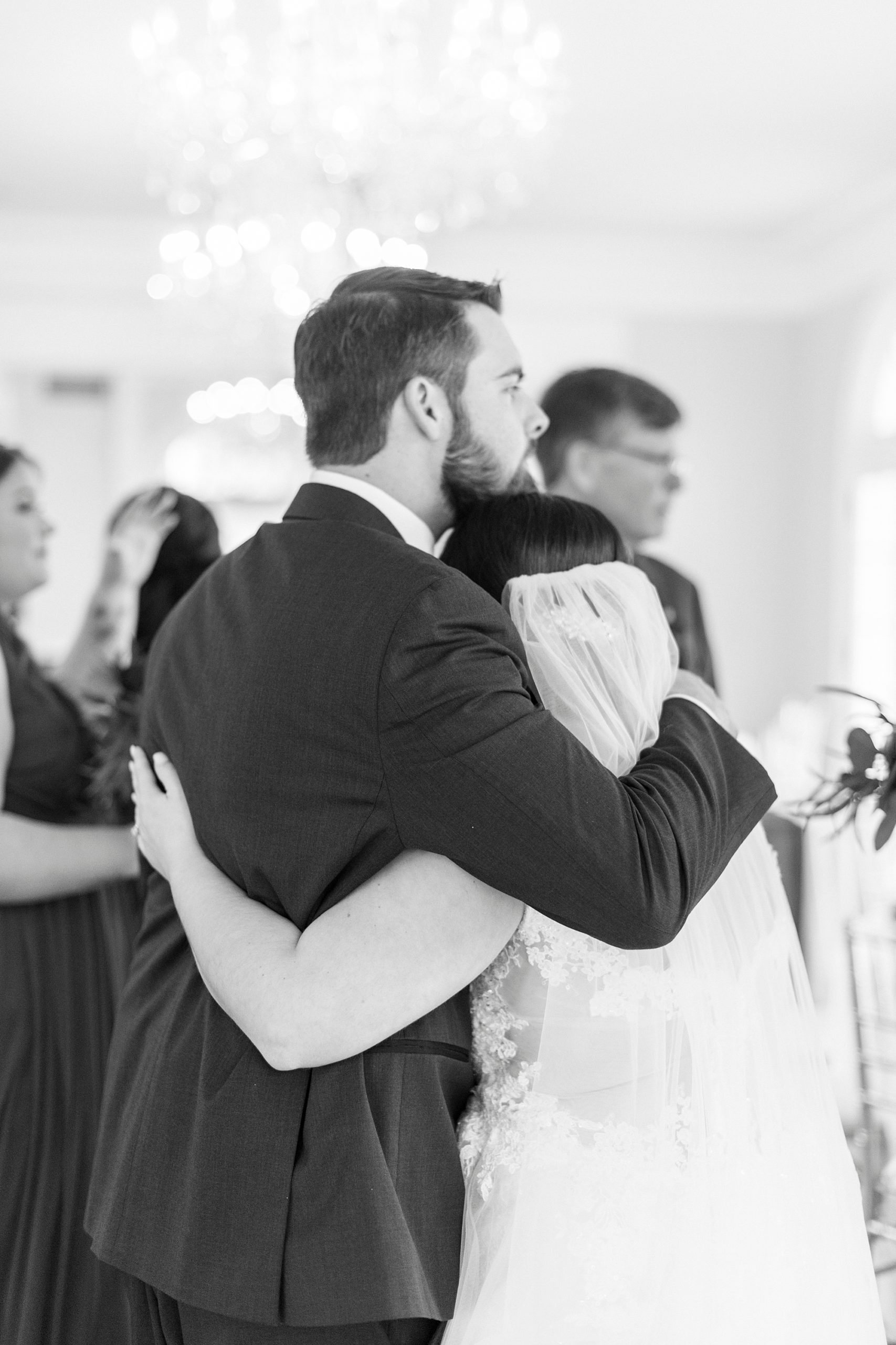 bride and groom hug during reception at Separk Mansion