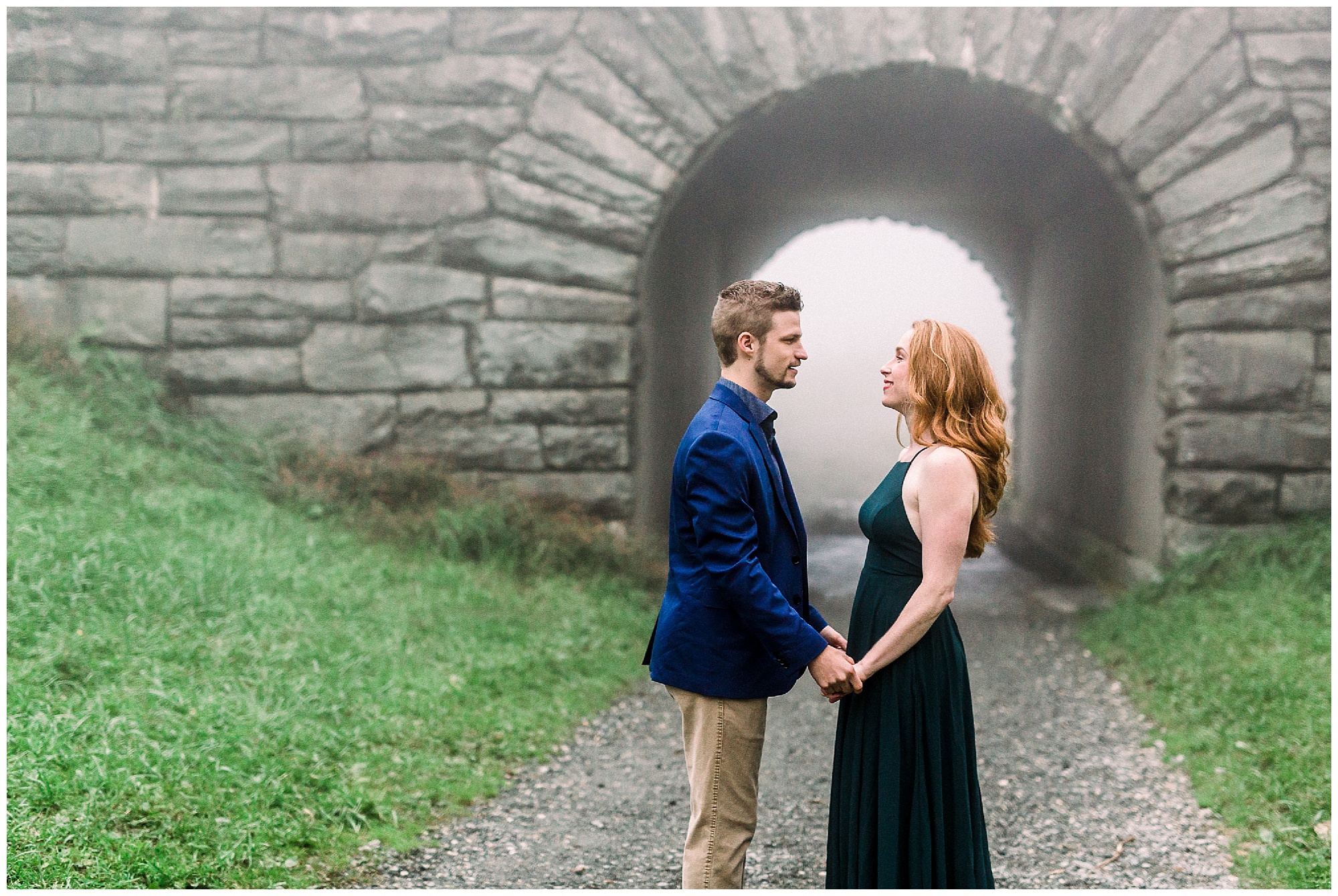 foggy mountain engagement session along stone bridge