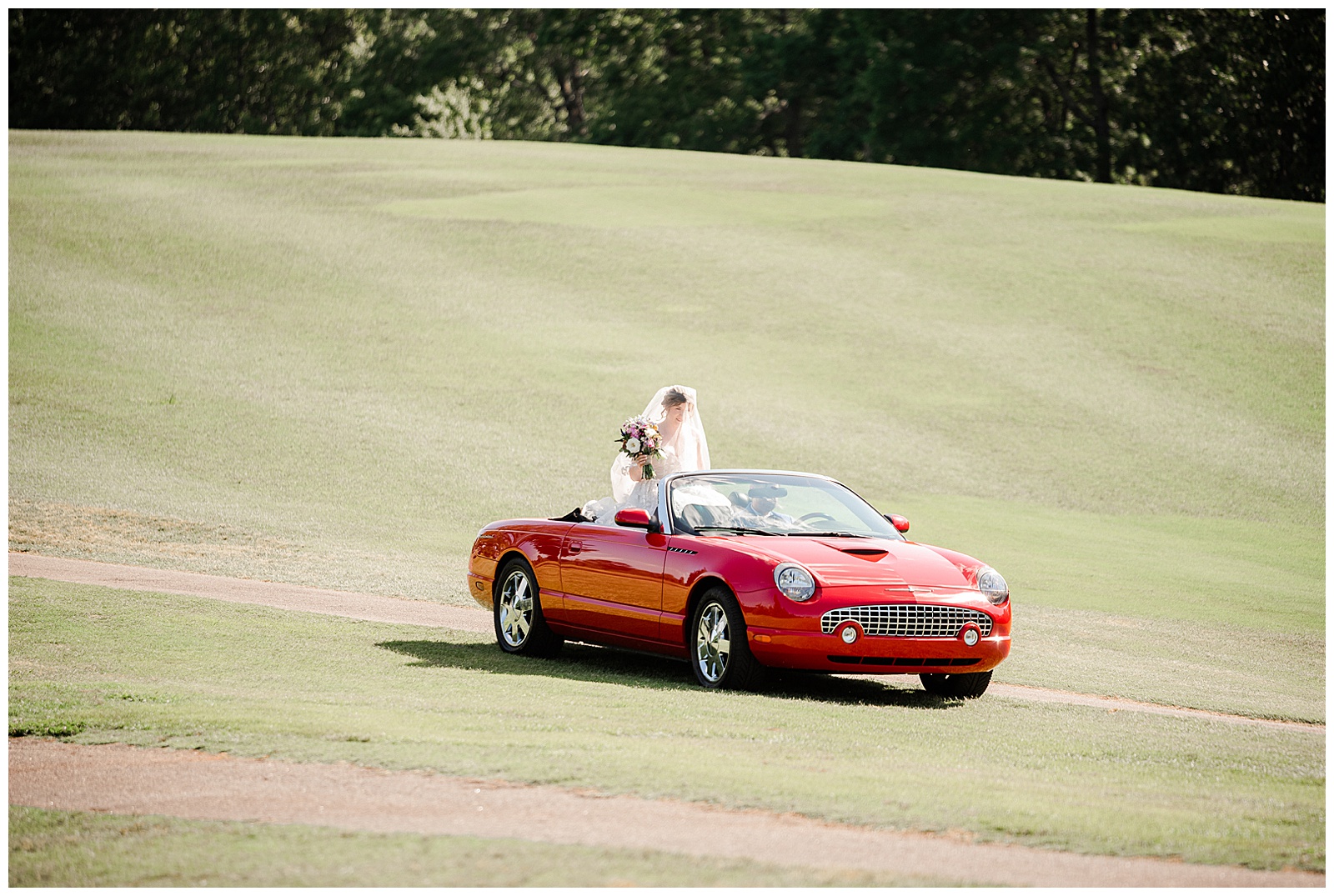 Bride Arrives at wedding in Red Ford Thunderbird from Outdoorsy Summer Wedding at North Carolina Lakehouse in the Mountains | check out the full wedding at KevynDixonPhoto.com