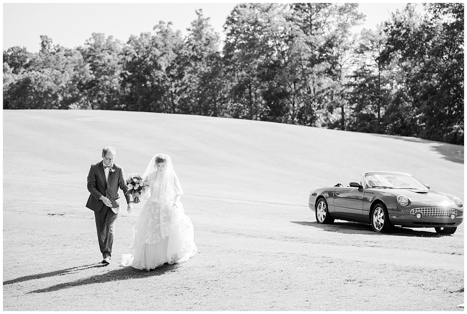 Bride Arrives at wedding in Red Ford Thunderbird from Outdoorsy Summer Wedding at North Carolina Lakehouse in the Mountains | check out the full wedding at KevynDixonPhoto.com
