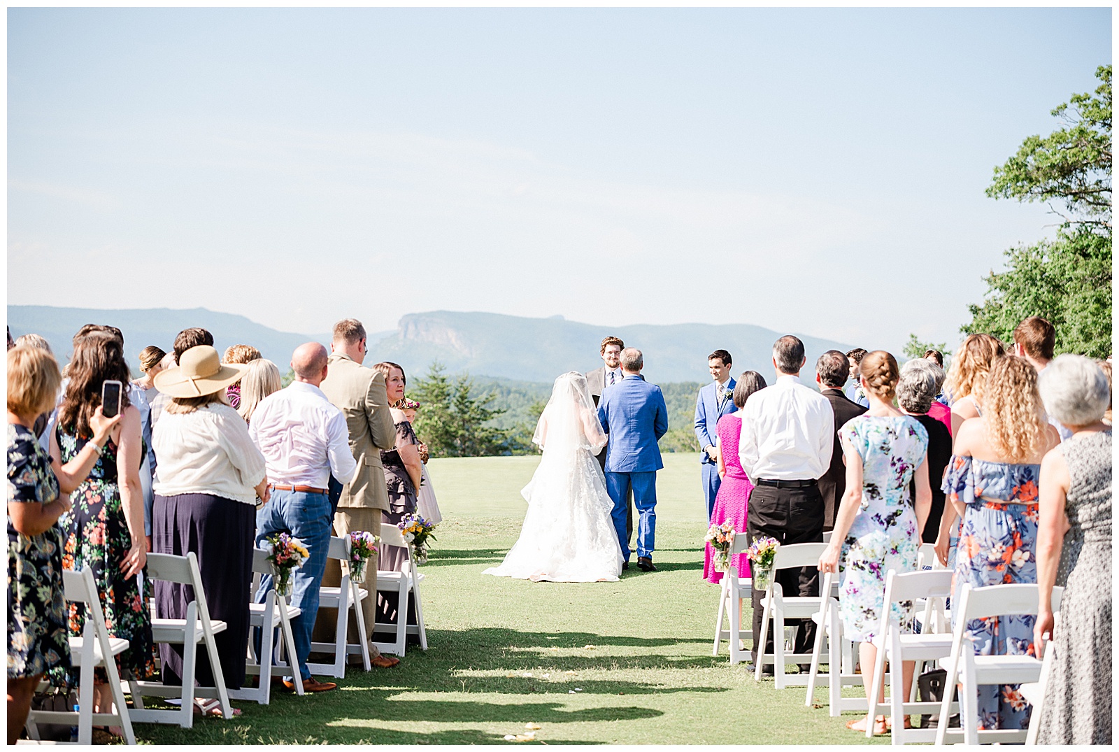 Dad walks bride down the aisle in Outdoorsy Summer Wedding at North Carolina Lakehouse in the Mountains | check out the full wedding at KevynDixonPhoto.com