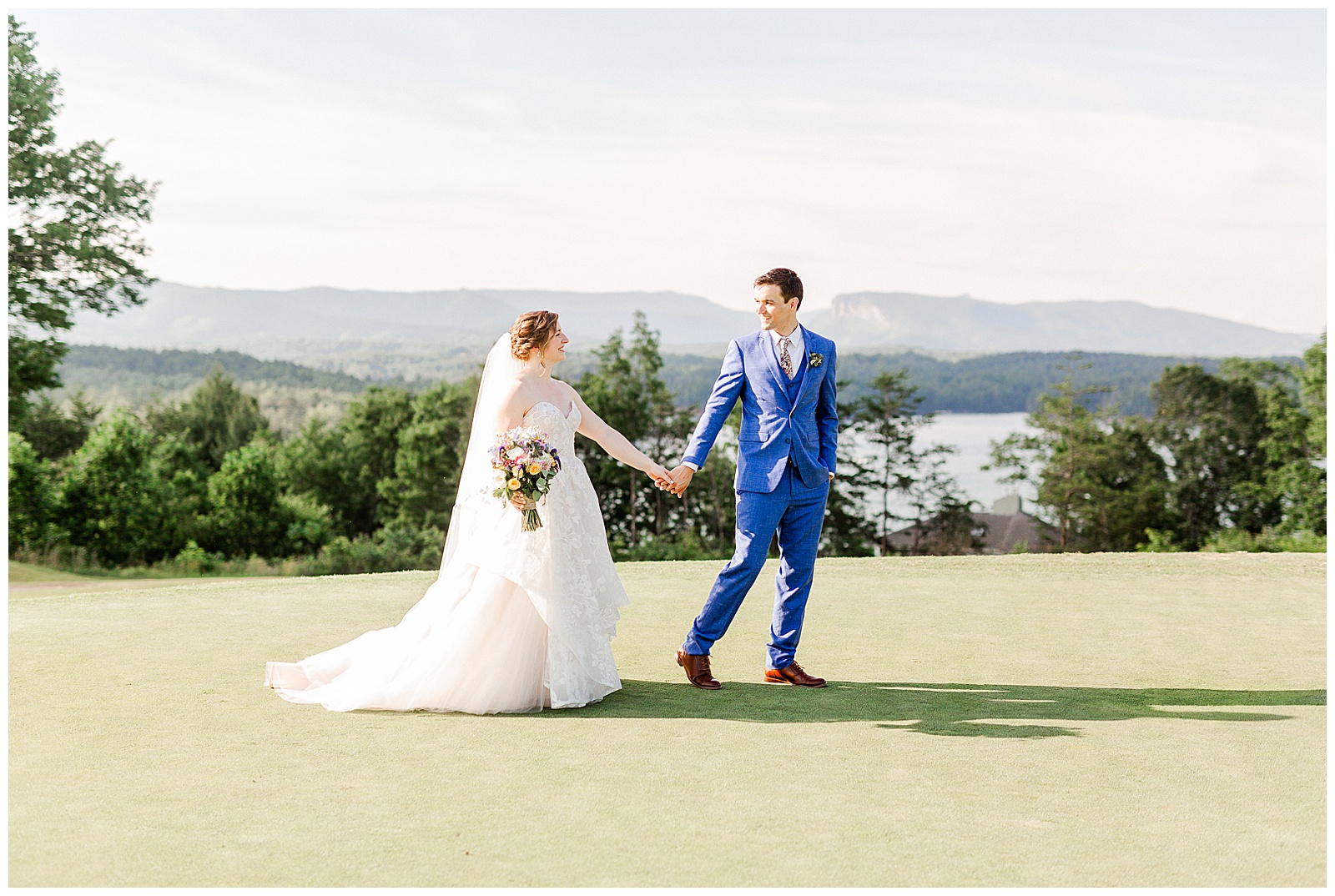 Stunning outdoor mountain photos of Bride and Groom from Outdoorsy Summer Wedding at North Carolina Lakehouse | check out the full wedding at KevynDixonPhoto.com