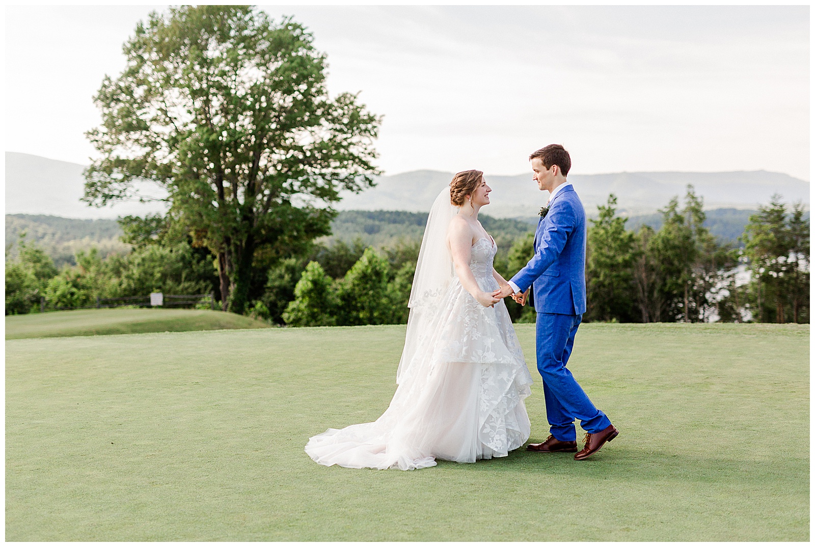 Stunning outdoor mountain photos of Bride and Groom from Outdoorsy Summer Wedding at North Carolina Lakehouse | check out the full wedding at KevynDixonPhoto.com