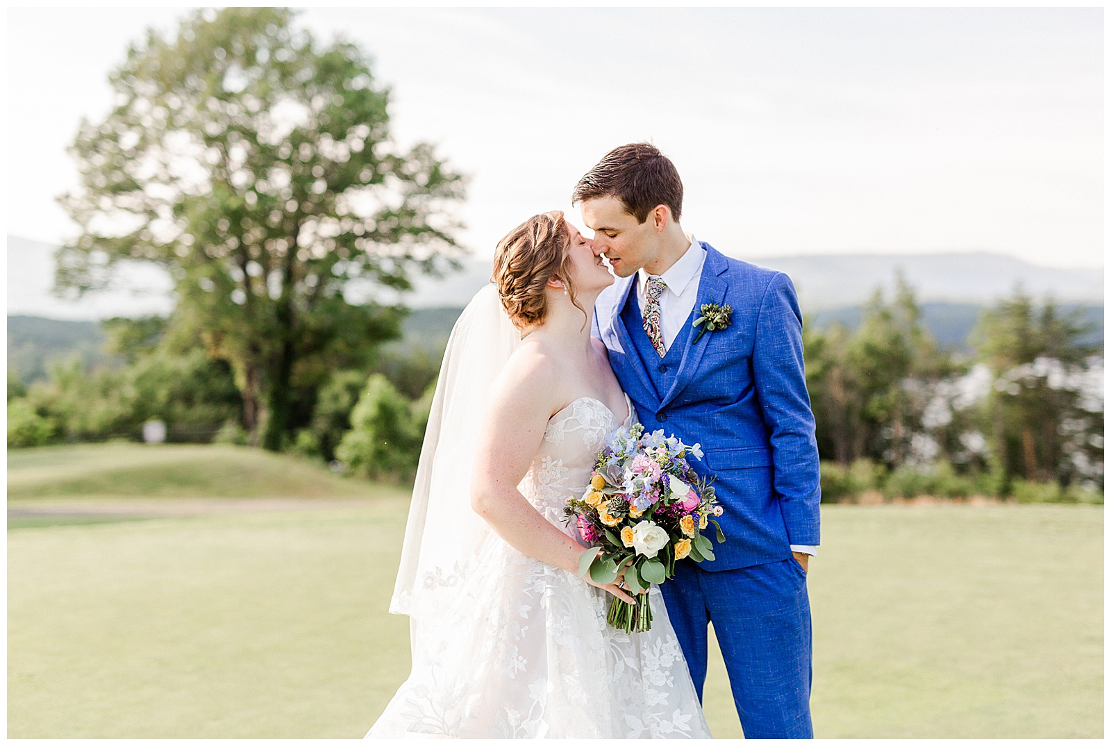 Stunning outdoor mountain photos of Bride and Groom from Outdoorsy Summer Wedding at North Carolina Lakehouse | check out the full wedding at KevynDixonPhoto.com