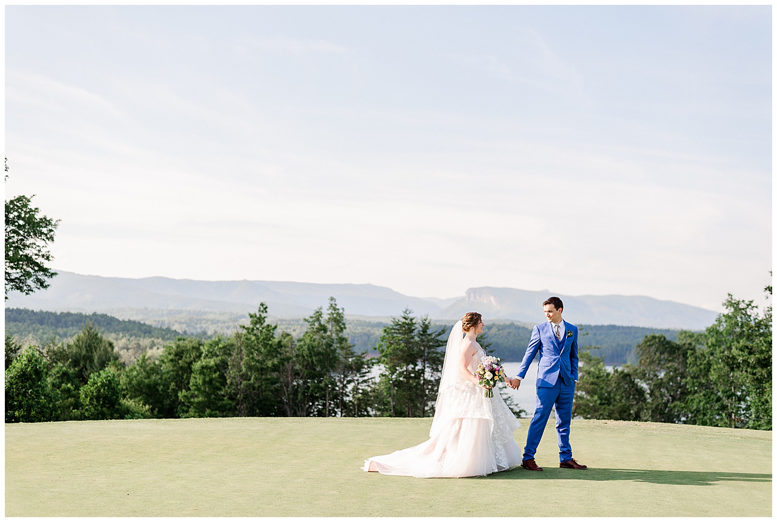 Stunning outdoor mountain photos of Bride and Groom from Outdoorsy Summer Wedding at North Carolina Lakehouse | check out the full wedding at KevynDixonPhoto.com