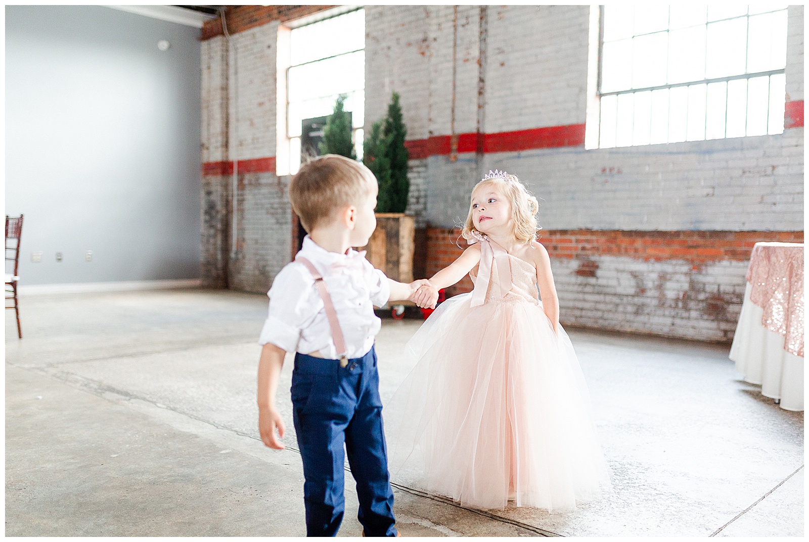 Adorable Flower Girl and Ring Boy Photos in Fluffy Pink Dress and Suspenders from Summer Wedding in Charlotte, NC | Check out the full wedding at KevynDixonPhoto.com