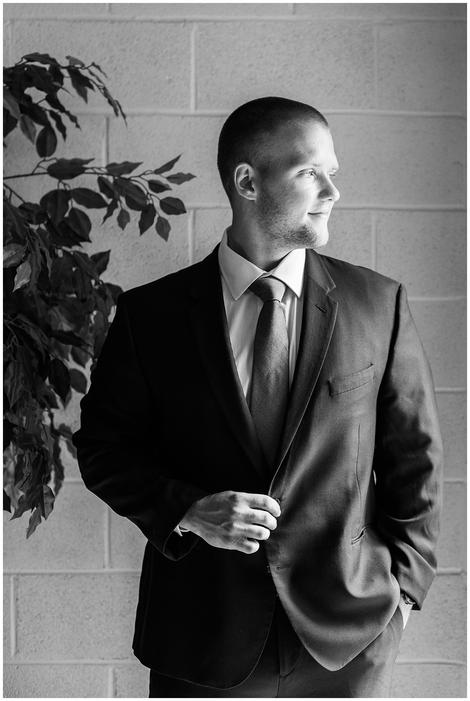 dapper groom getting ready in navy blue suit from Summer Wedding in Charlotte, NC | check out the full wedding at KevynDixonPhoto.com