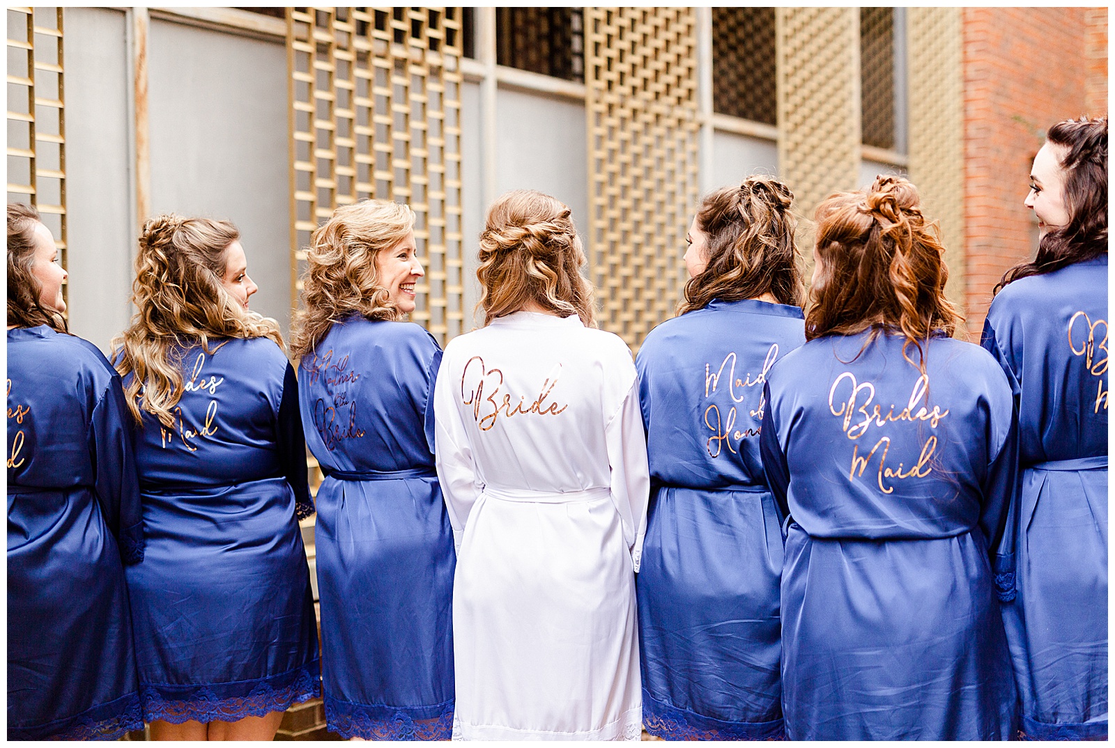 Cute matching navy blue robes for bridesmaid and bride group photo from Summer Wedding in Charlotte, NC | check out the full wedding at KevynDixonPhoto.com