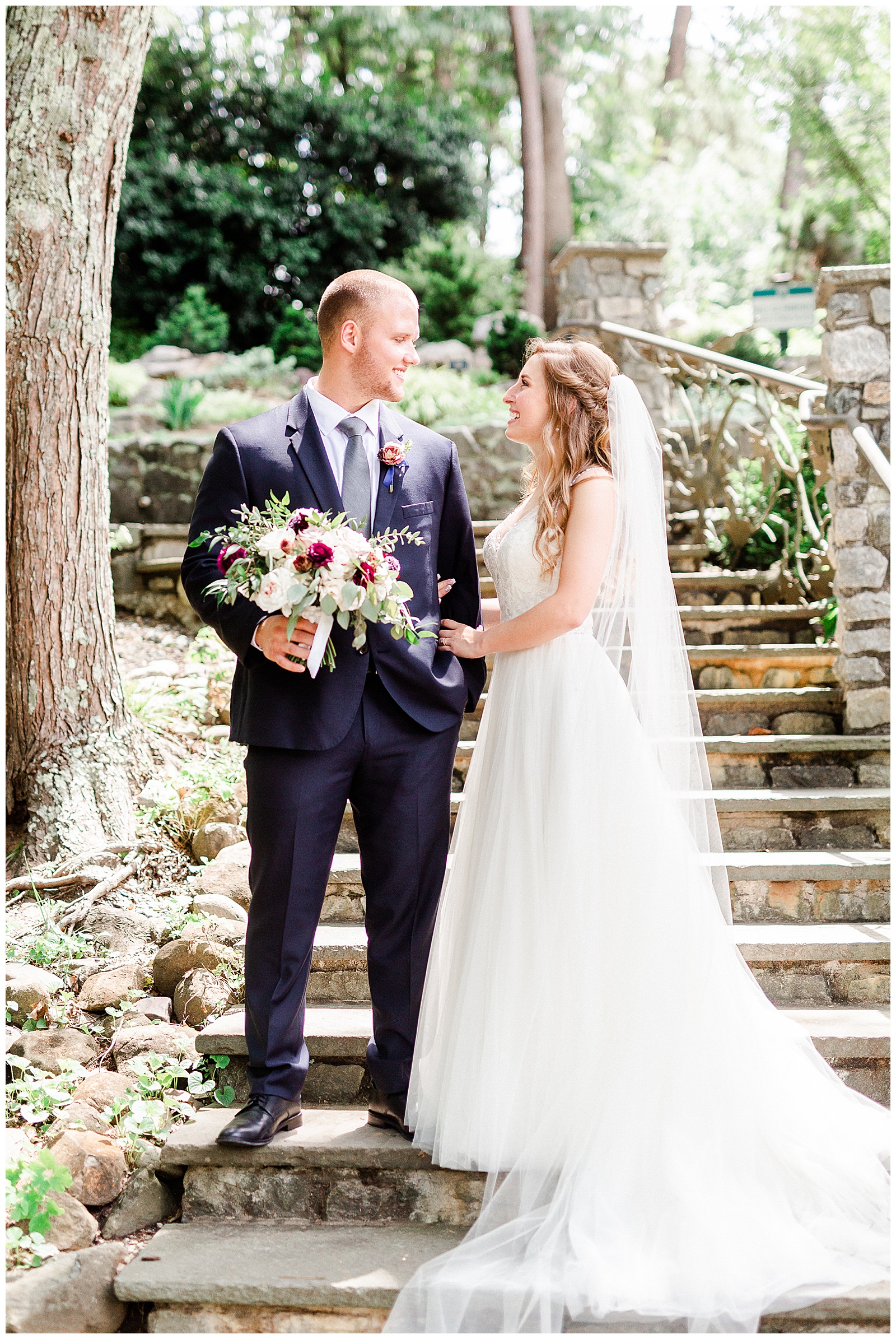 Stunning Model Photos of Gorgeous Bride in Simple V-Neck Lace wedding dress and dapper groom in gray-blue suit from Elegant Modern Summer Wedding in Charlotte, NC | check out the full wedding at KevynDixonPhoto.com