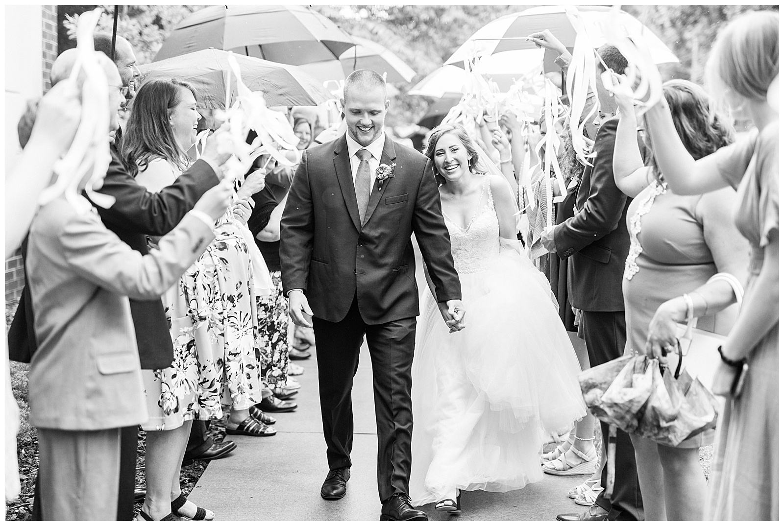Colorful Umbrella Exit from Elegant Modern Summer Wedding in Charlotte, NC | check out the full wedding at KevynDixonPhoto.com