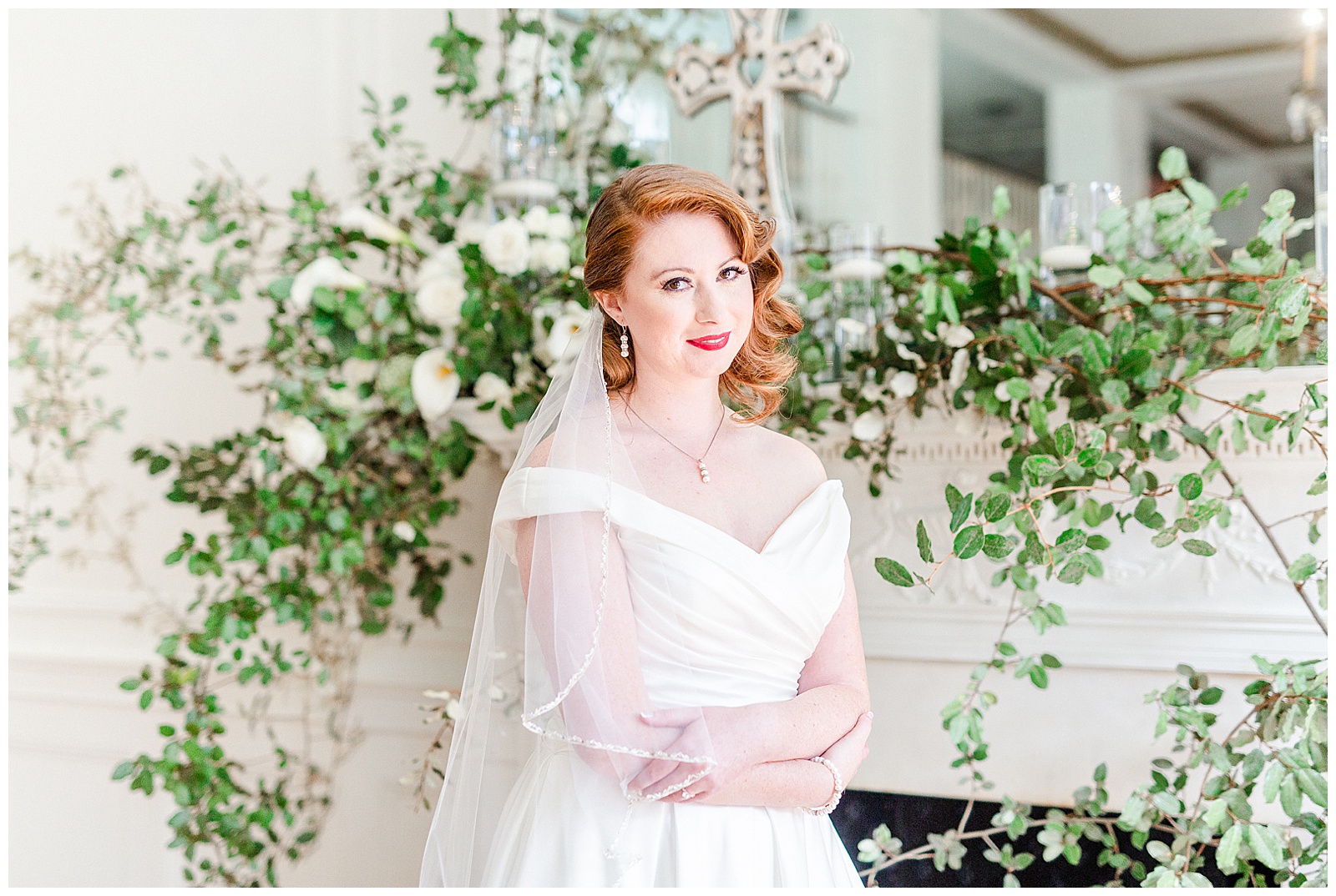 Gorgeous Red-Haired Bride at elegant floral indoor venue in 1940s Modern Vintage Wedding in Charlotte, NC | check out the full wedding at KevynDixonPhoto.com 