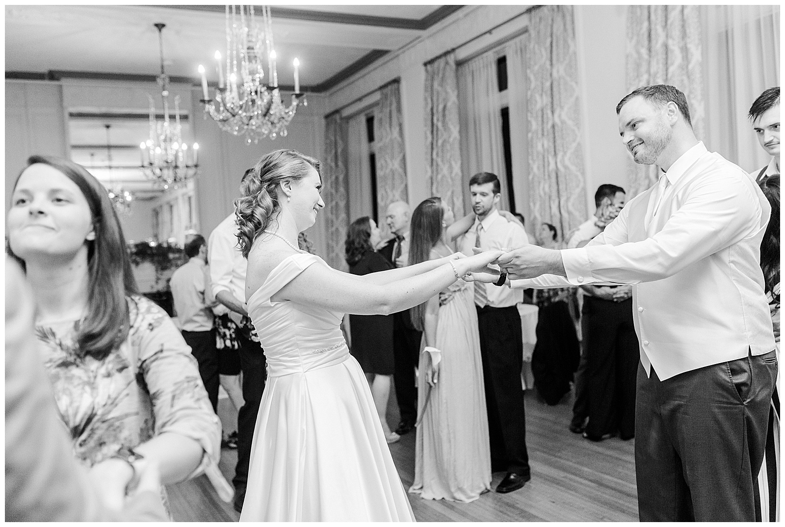 Bride and Groom share a special moment at elegant indoor floral venue in 1940s Modern Vintage Wedding in Charlotte, NC | check out the full wedding at KevynDixonPhoto.com