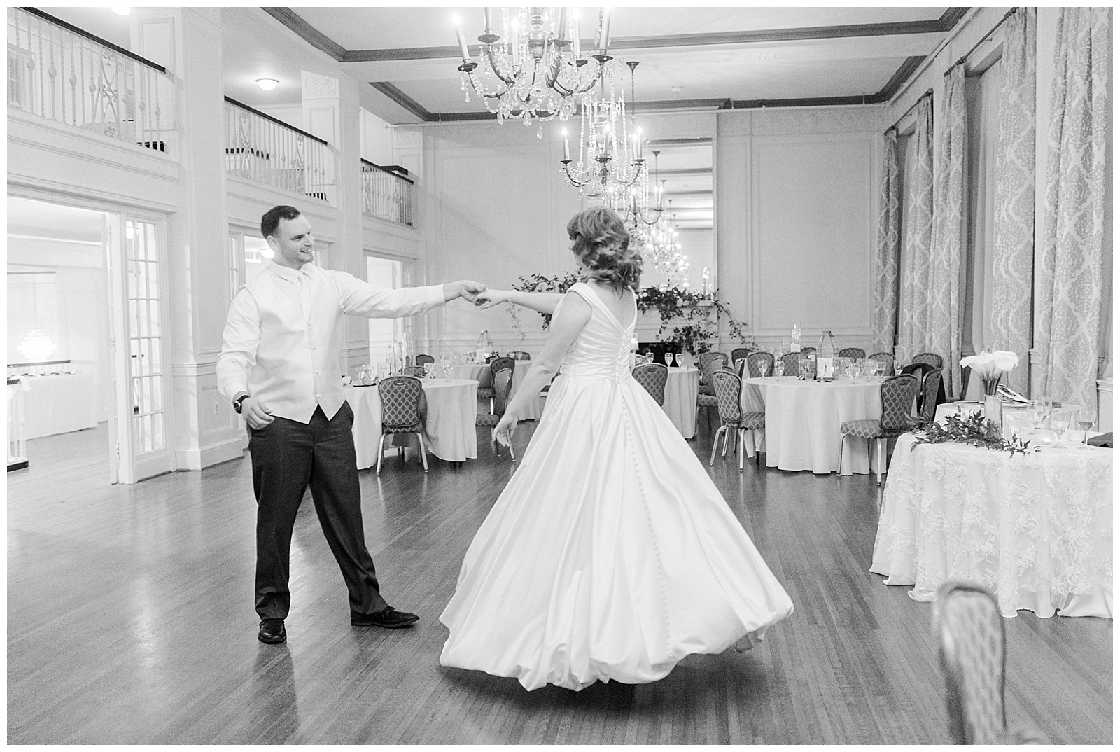 Bride and Groom share a special moment at elegant indoor floral venue in 1940s Modern Vintage Wedding in Charlotte, NC | check out the full wedding at KevynDixonPhoto.com