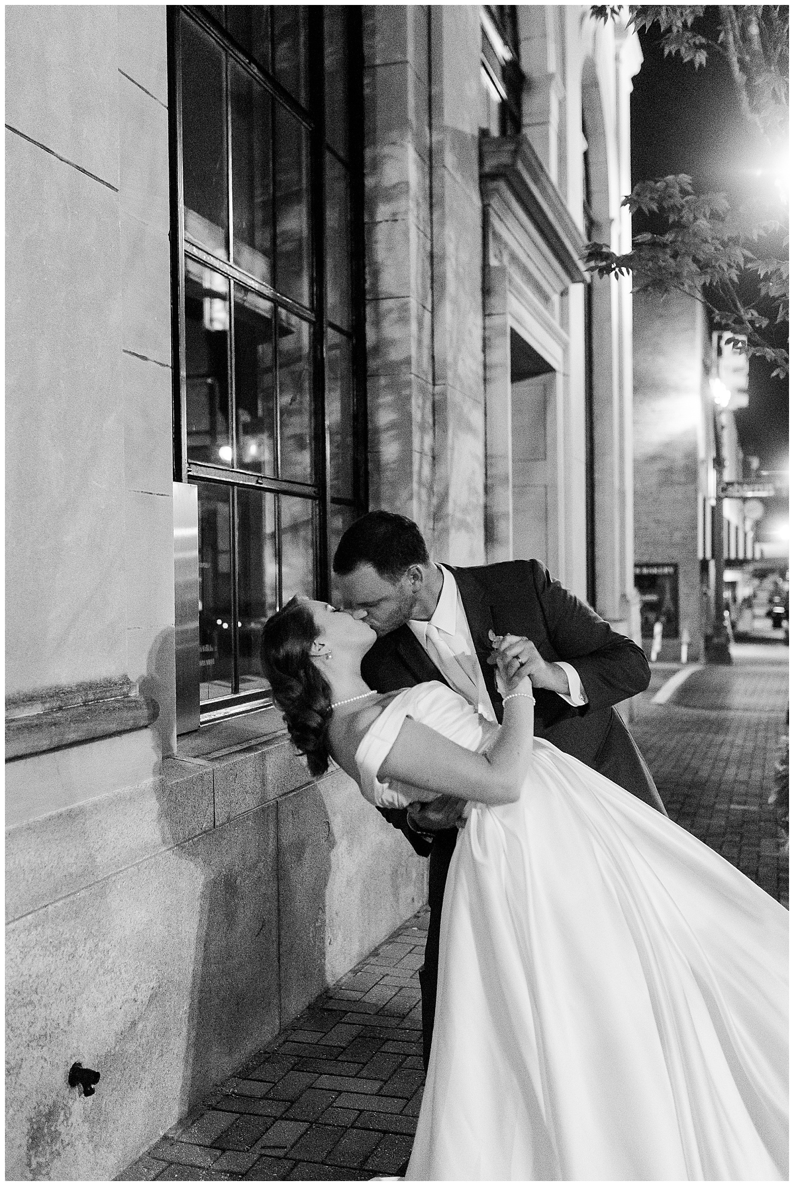 Bride and Groom share a special moment at elegant indoor floral venue in 1940s Modern Vintage Wedding in Charlotte, NC | check out the full wedding at KevynDixonPhoto.com