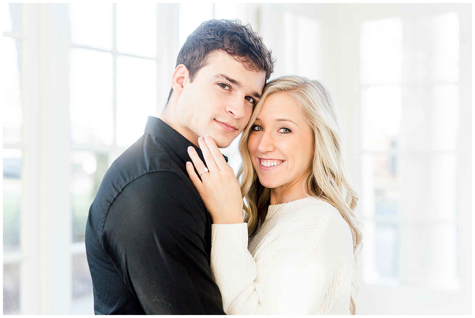 Adorable Couple Posing in Gorgeous Light and Airy Separk Mansion Engagement Session - classy cute white sweater pencil skirt and tall black boots outfit ideas