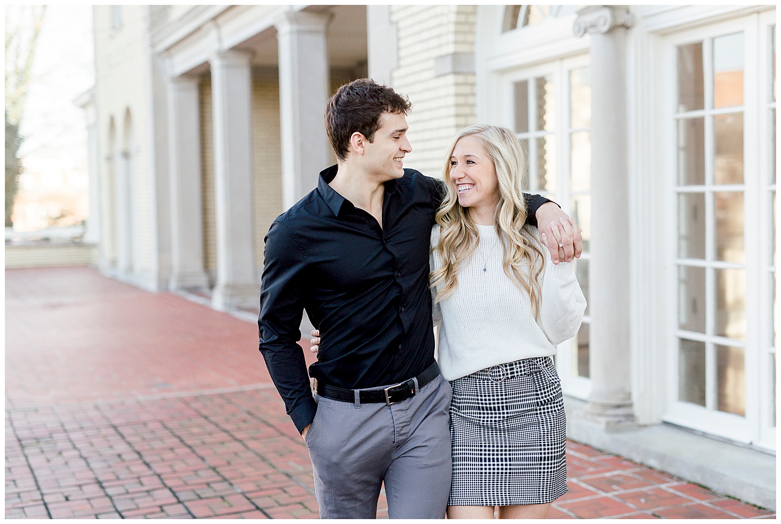 Adorable Couple Posing Outdoors in Gorgeous Light and Airy Separk Mansion Winter Engagement Session - classy cute white sweater pencil skirt and tall black boots outfit ideas