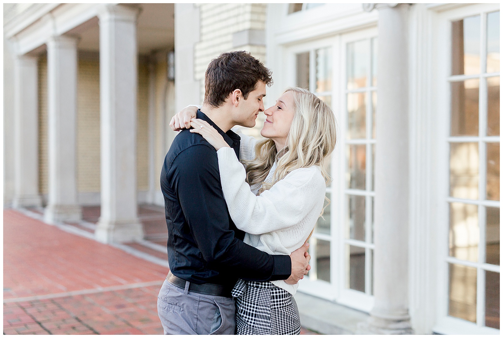 Adorable Couple Posing Outdoors in Gorgeous Light and Airy Separk Mansion Winter Engagement Session - classy cute white sweater pencil skirt and tall black boots outfit ideas