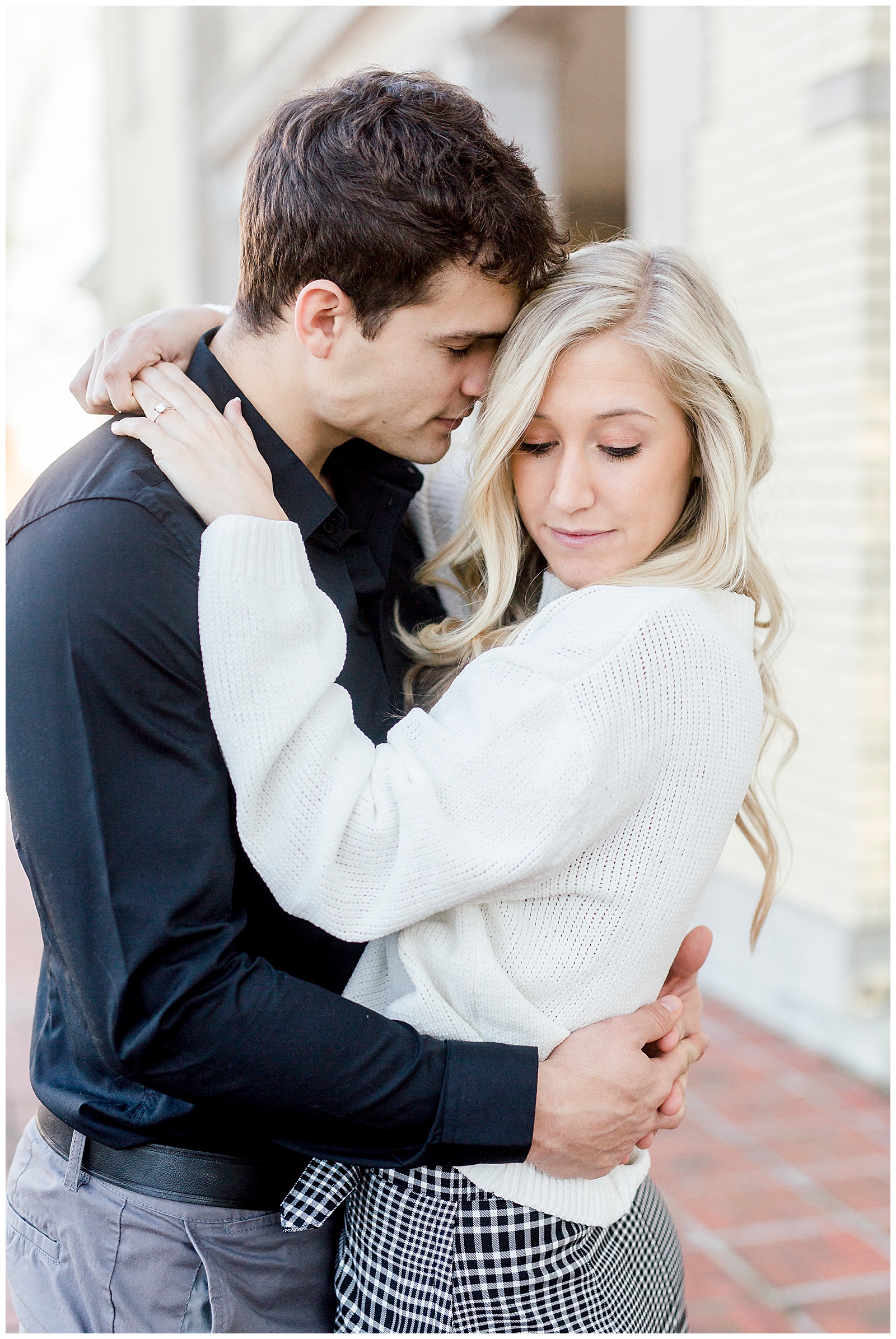 Adorable Couple Posing Outdoors in Gorgeous Light and Airy Separk Mansion Winter Engagement Session - classy cute white sweater pencil skirt and tall black boots outfit ideas
