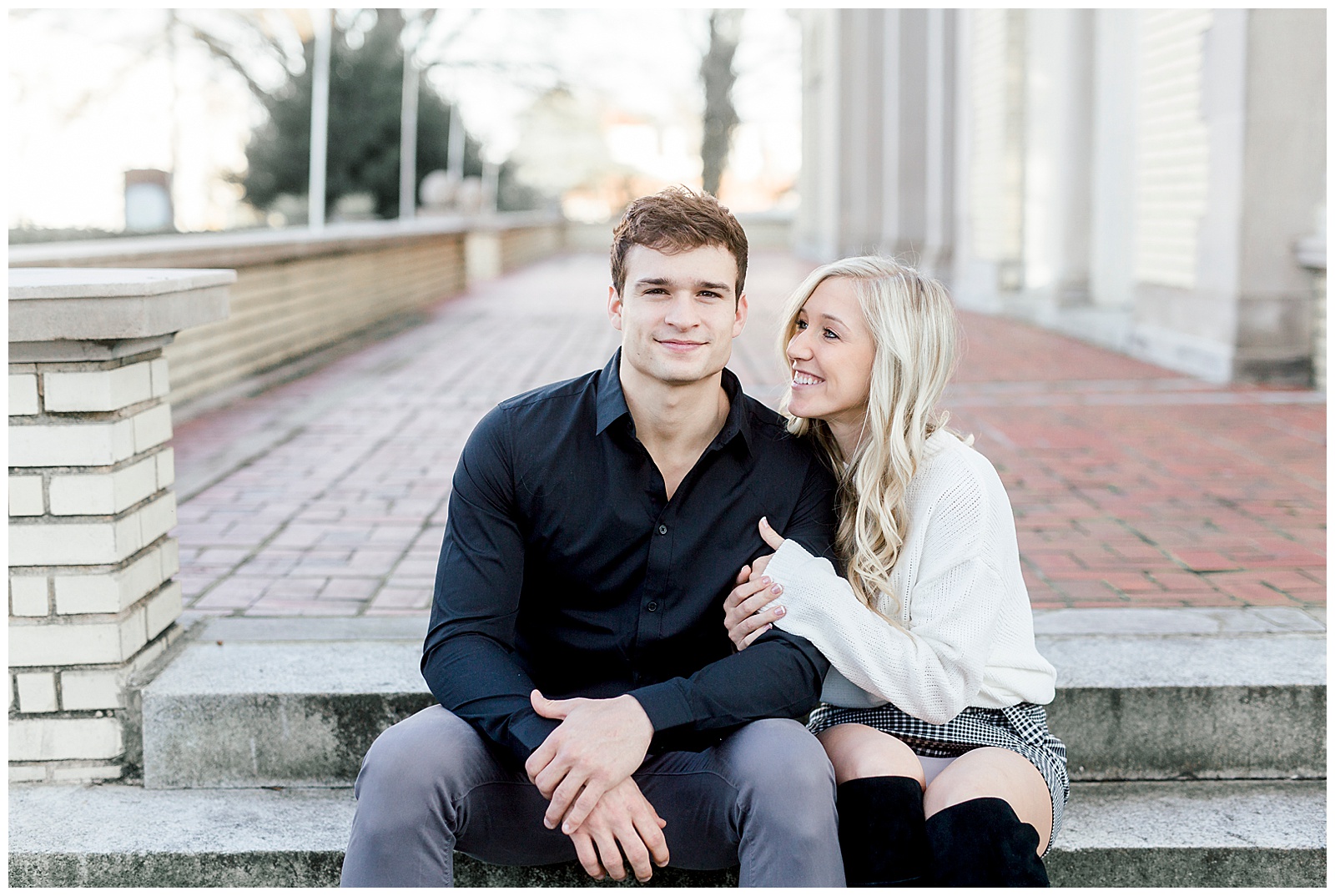 Adorable Couple Posing Outdoors in Gorgeous Light and Airy Separk Mansion Winter Engagement Session - classy cute white sweater pencil skirt and tall black boots outfit ideas