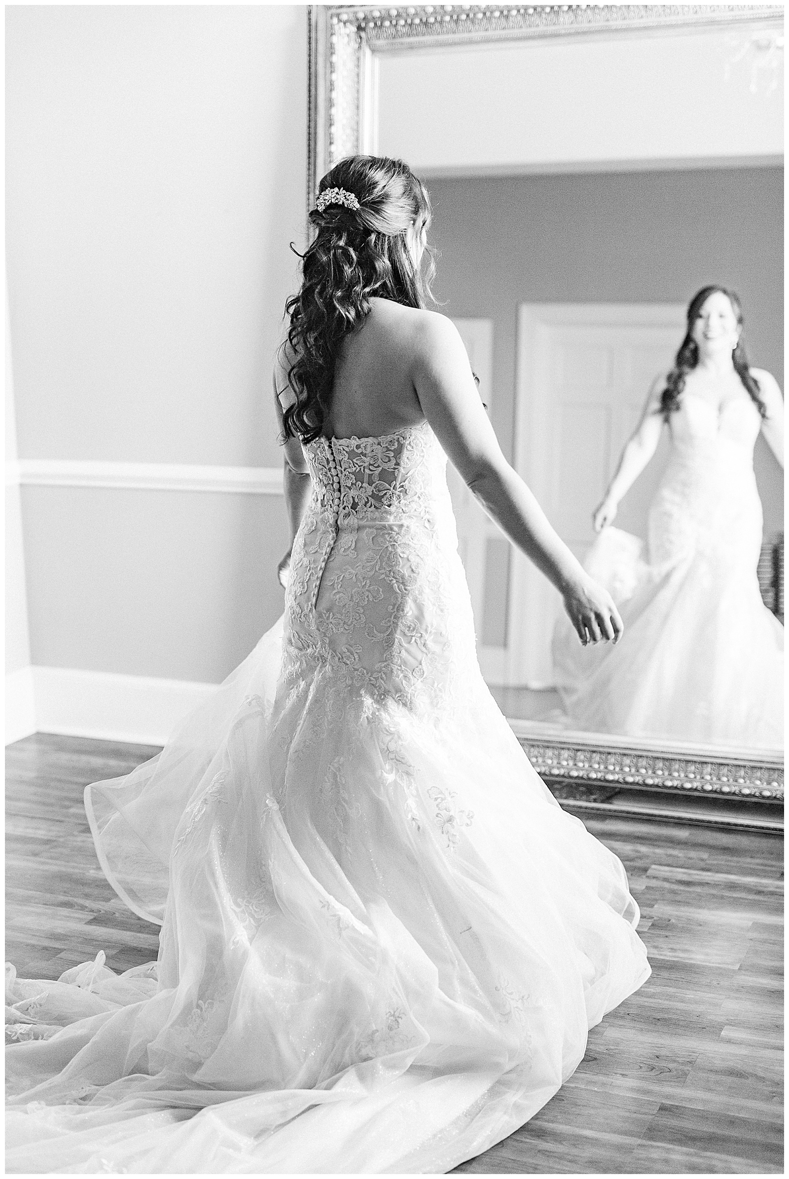 Bride Looking in Mirror with Lace Dress from Light and Airy Outdoor Wedding at Separk Mansion in Gastonia, NC | Kevyn Dixon Photography